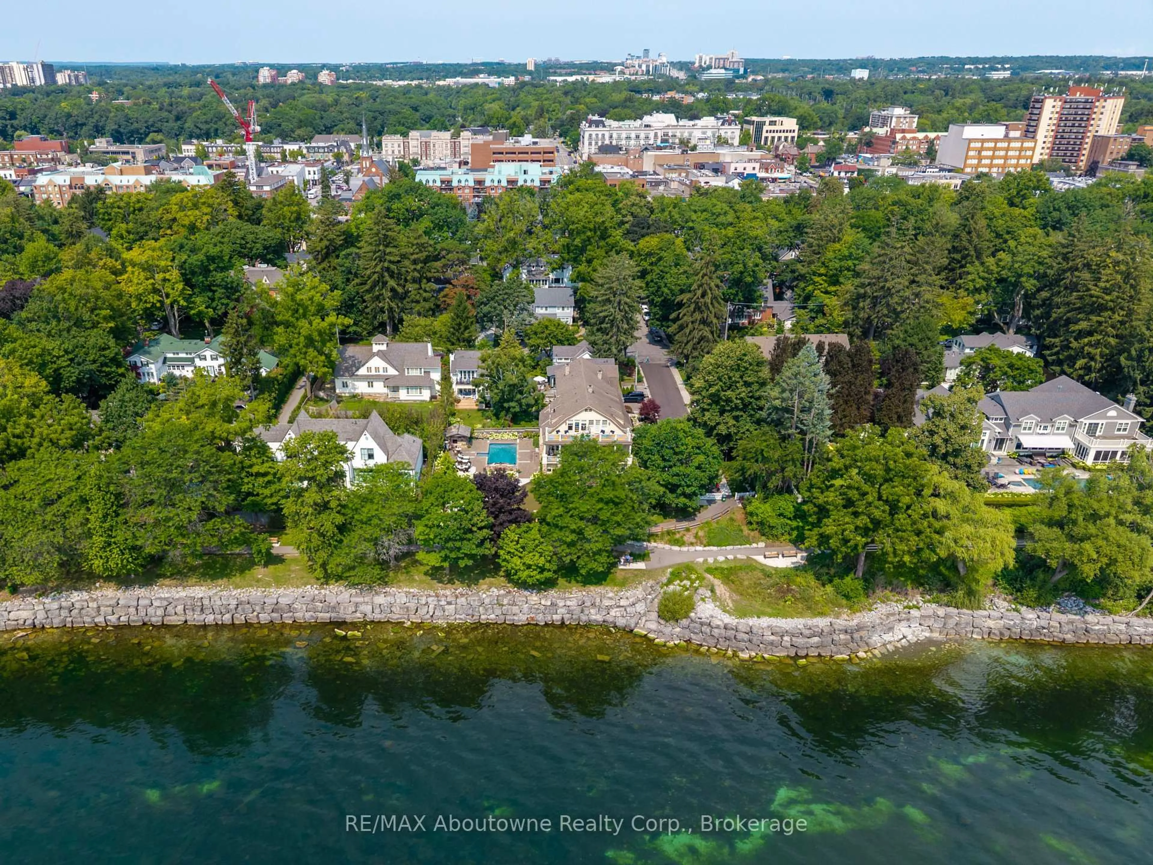 A pic from outside/outdoor area/front of a property/back of a property/a pic from drone, water/lake/river/ocean view for 26 Trafalgar Rd, Oakville Ontario L6J 3E7