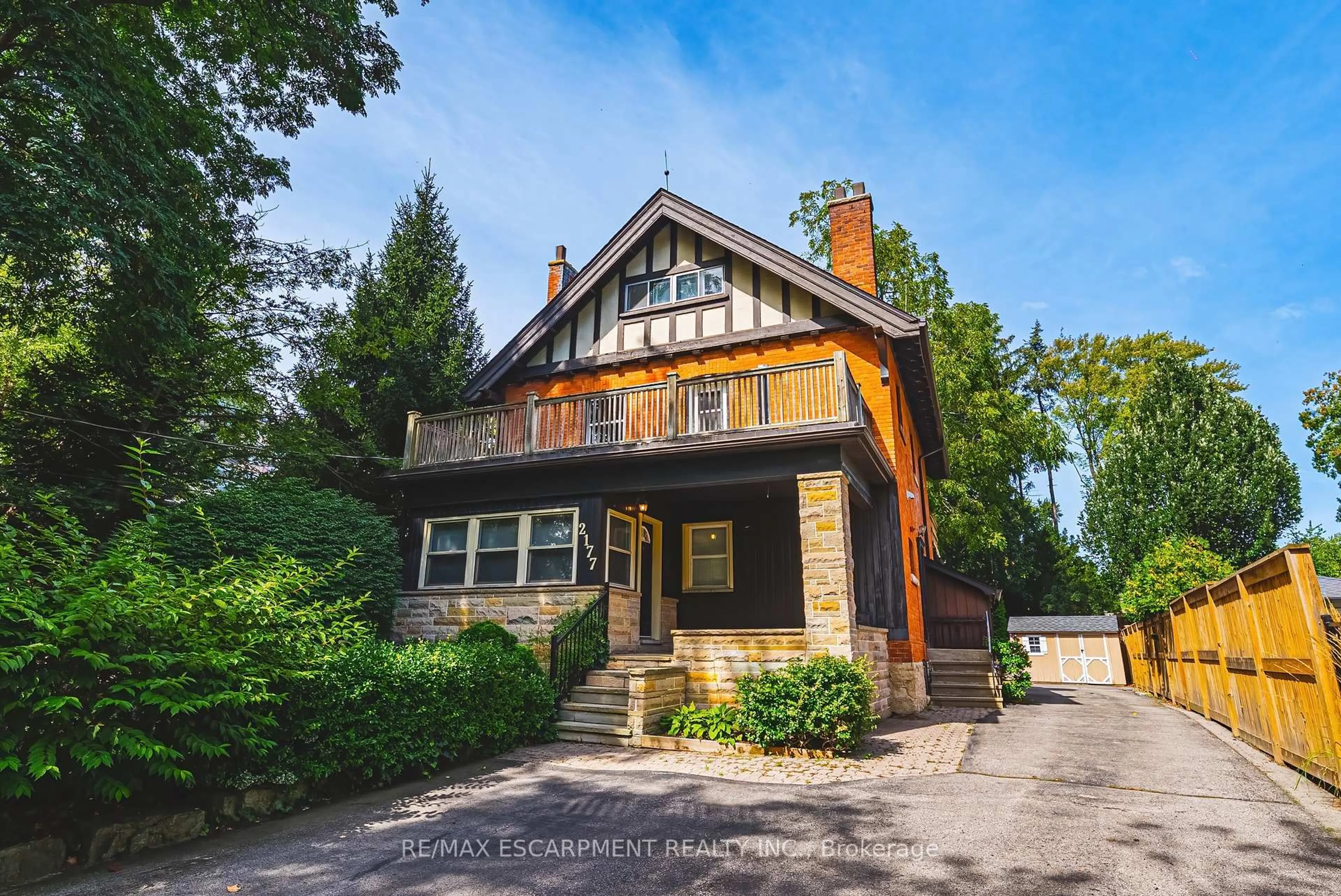 Home with brick exterior material, street for 2177 Lakeshore Rd, Burlington Ontario L7R 1A5