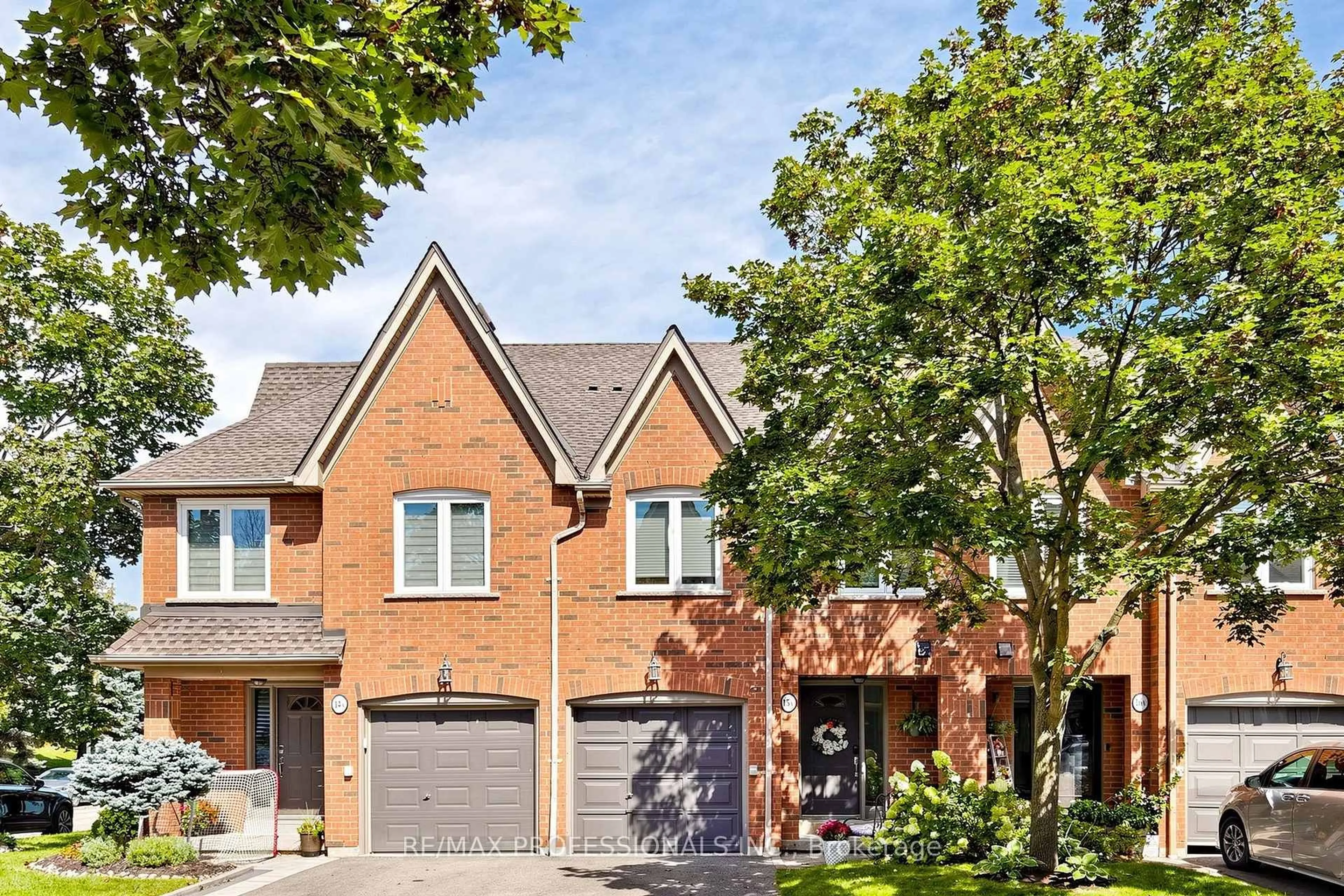 Home with brick exterior material, street for 1064 Queen St #15A, Mississauga Ontario L5H 4K3