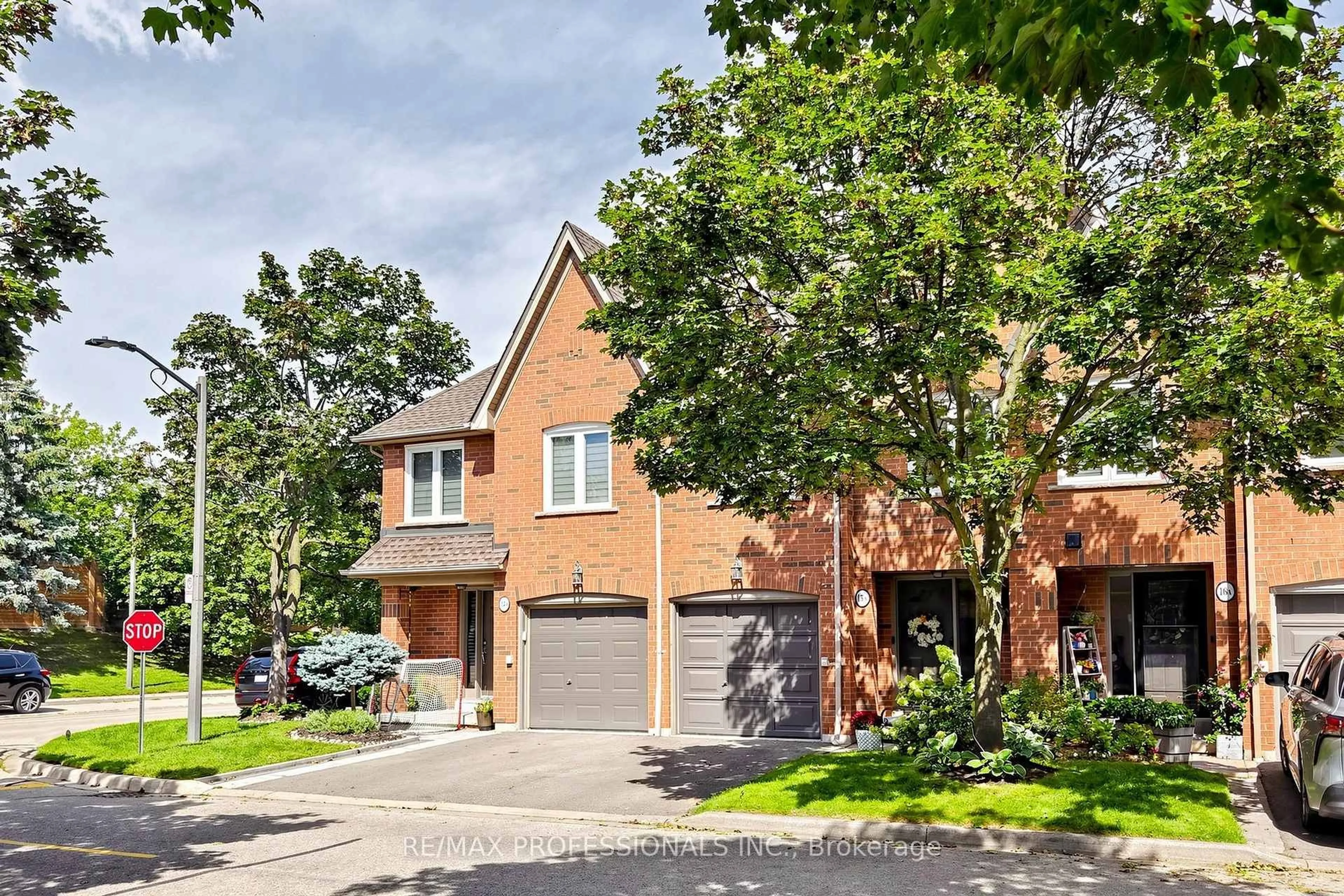 Home with brick exterior material, street for 1064 Queen St #15A, Mississauga Ontario L5H 4K3