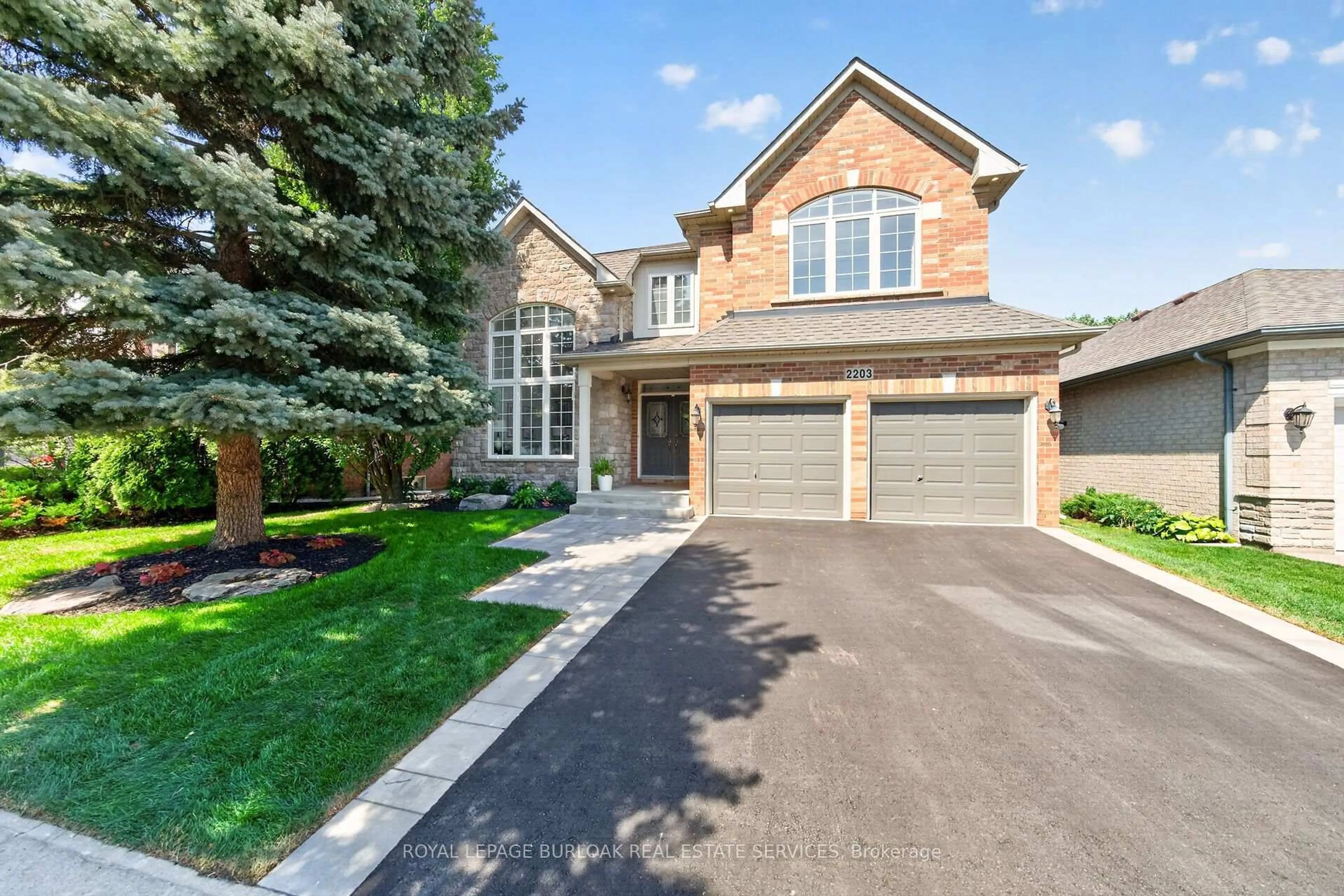 Home with brick exterior material, street for 2203 Turnberry Rd, Burlington Ontario L7M 4P9