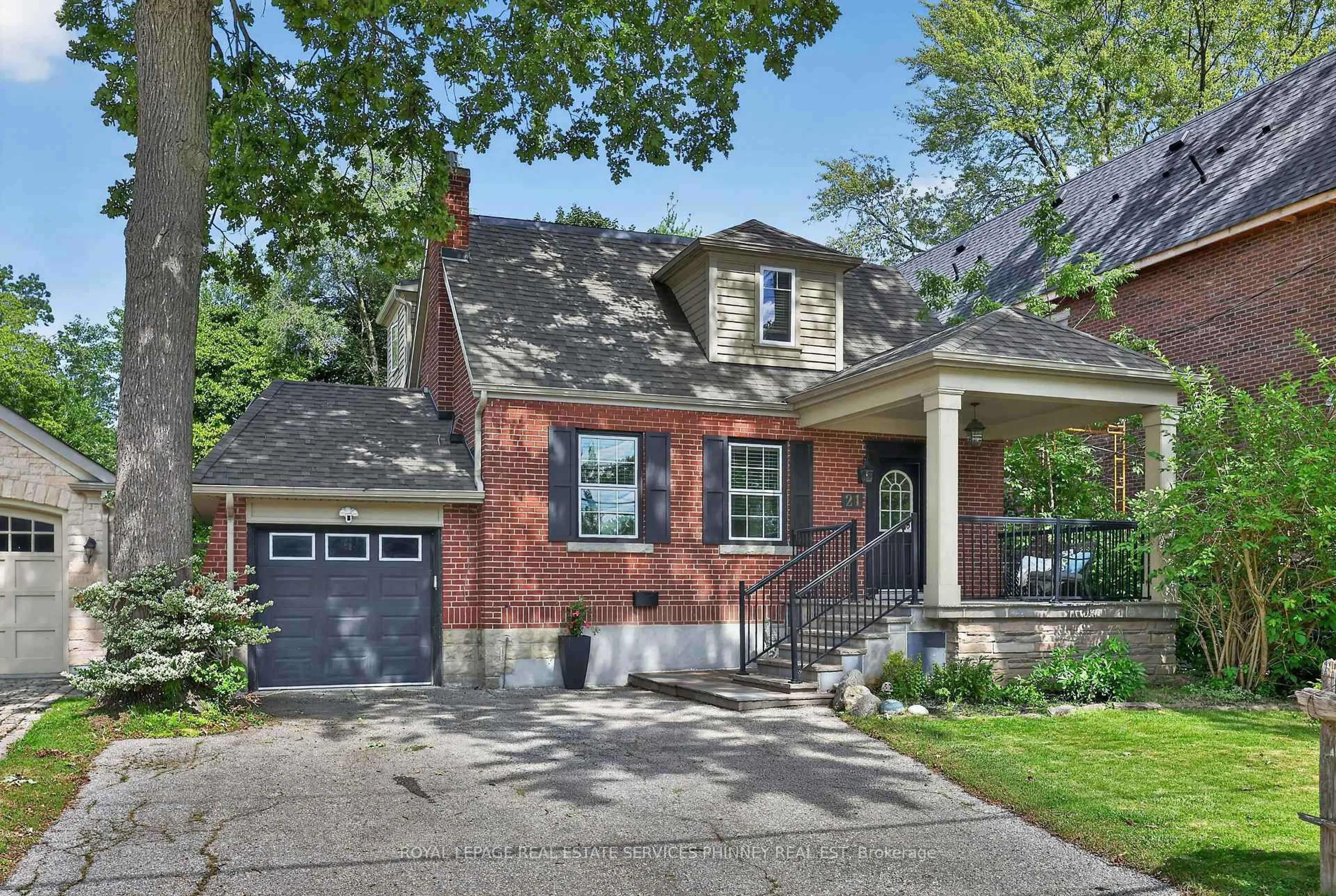 Home with brick exterior material, street for 21 Cumberland Dr, Mississauga Ontario L5G 3M7
