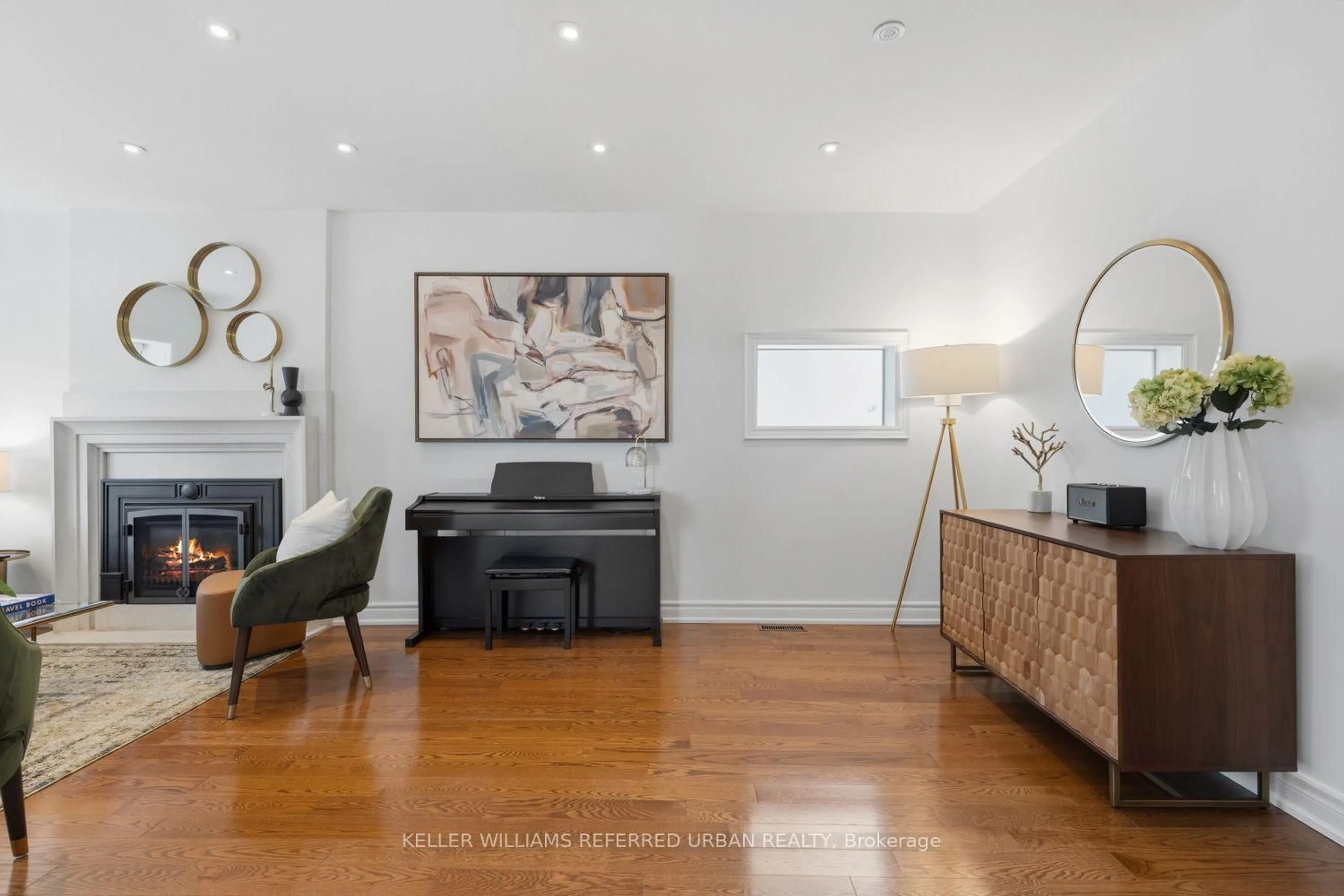 Living room with furniture, wood/laminate floor for 109 Kennedy Ave, Toronto Ontario M6S 2X8