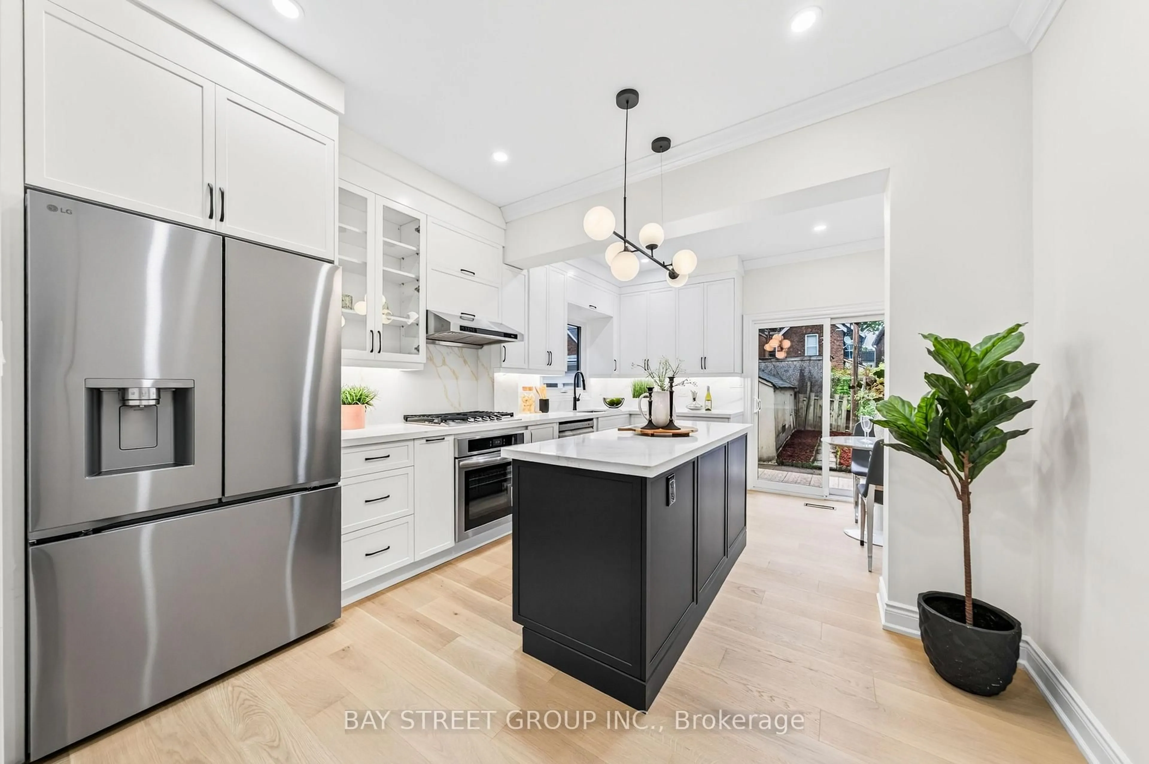 Open concept kitchen, unknown for 49 Emerson Ave, Toronto Ontario M6H 3S7