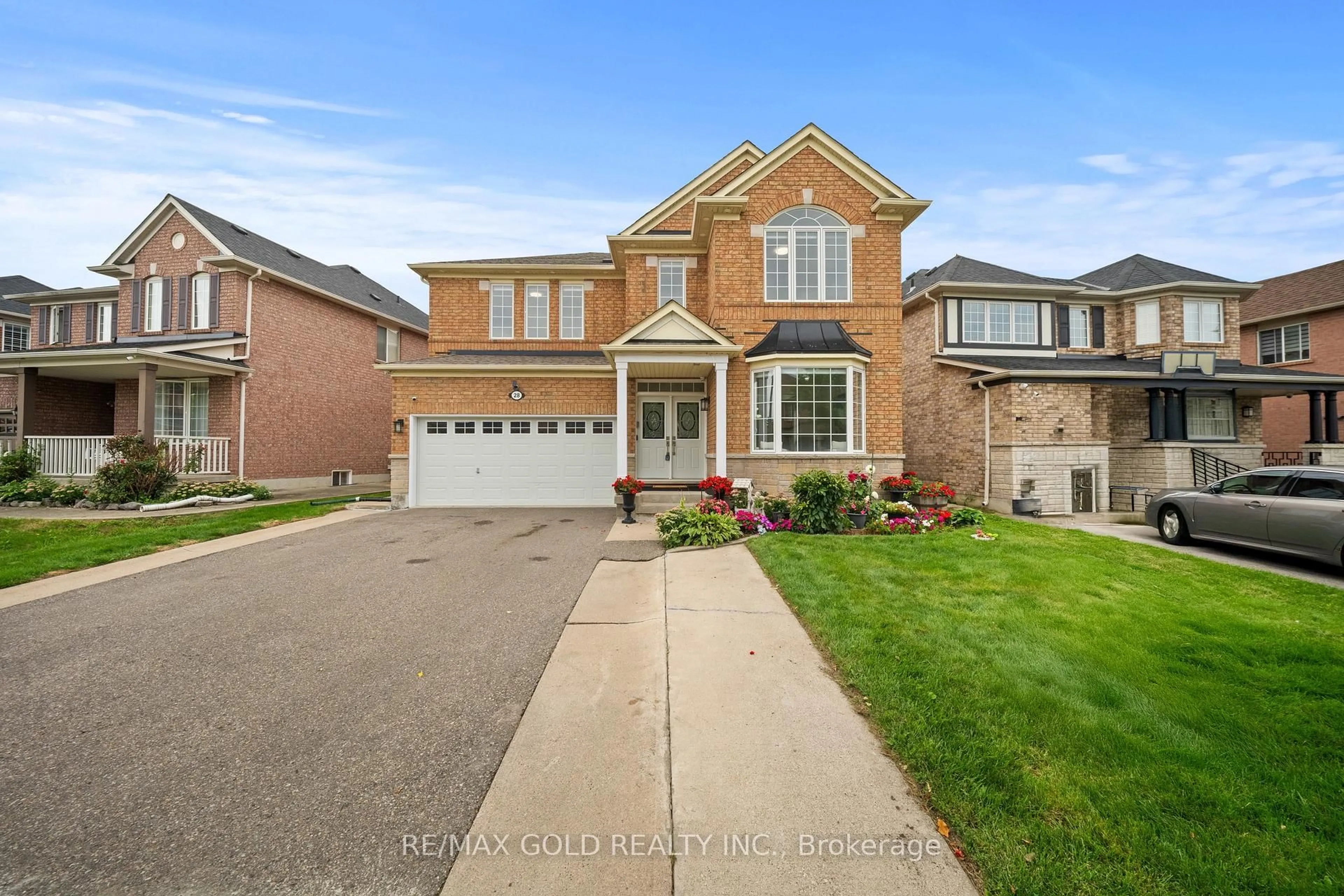 Home with brick exterior material, street for 28 Bottomwood St, Brampton Ontario L5S 0A7