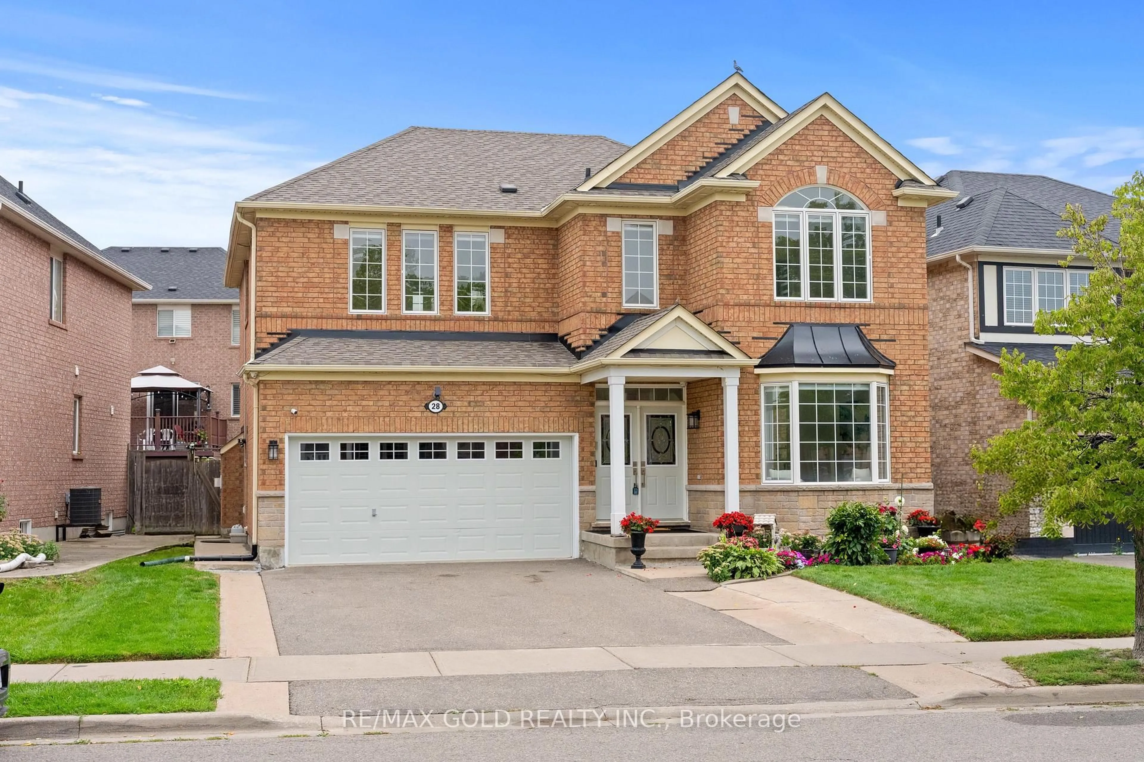 Home with brick exterior material, street for 28 Bottomwood St, Brampton Ontario L5S 0A7