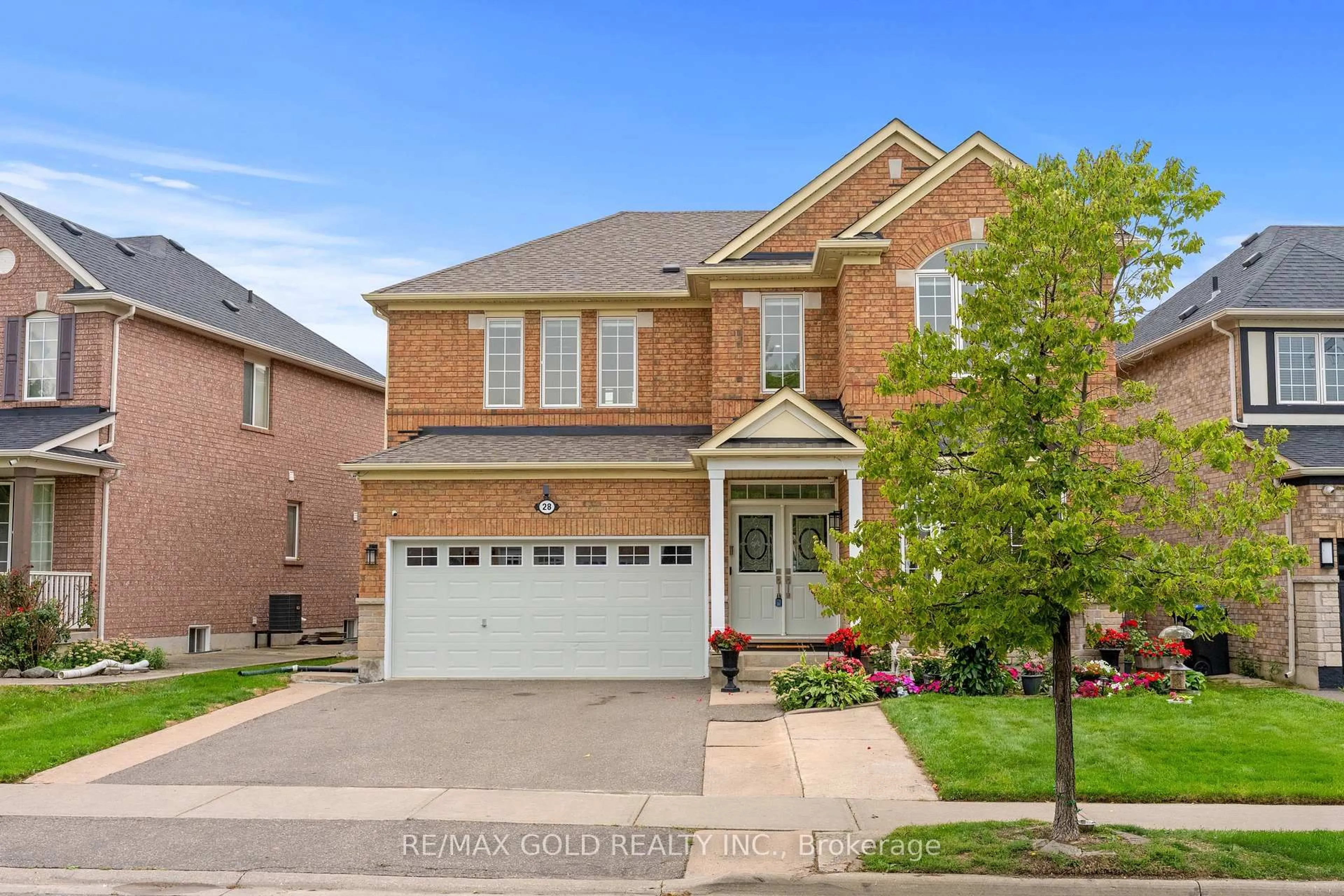 Home with brick exterior material, street for 28 Bottomwood St, Brampton Ontario L5S 0A7