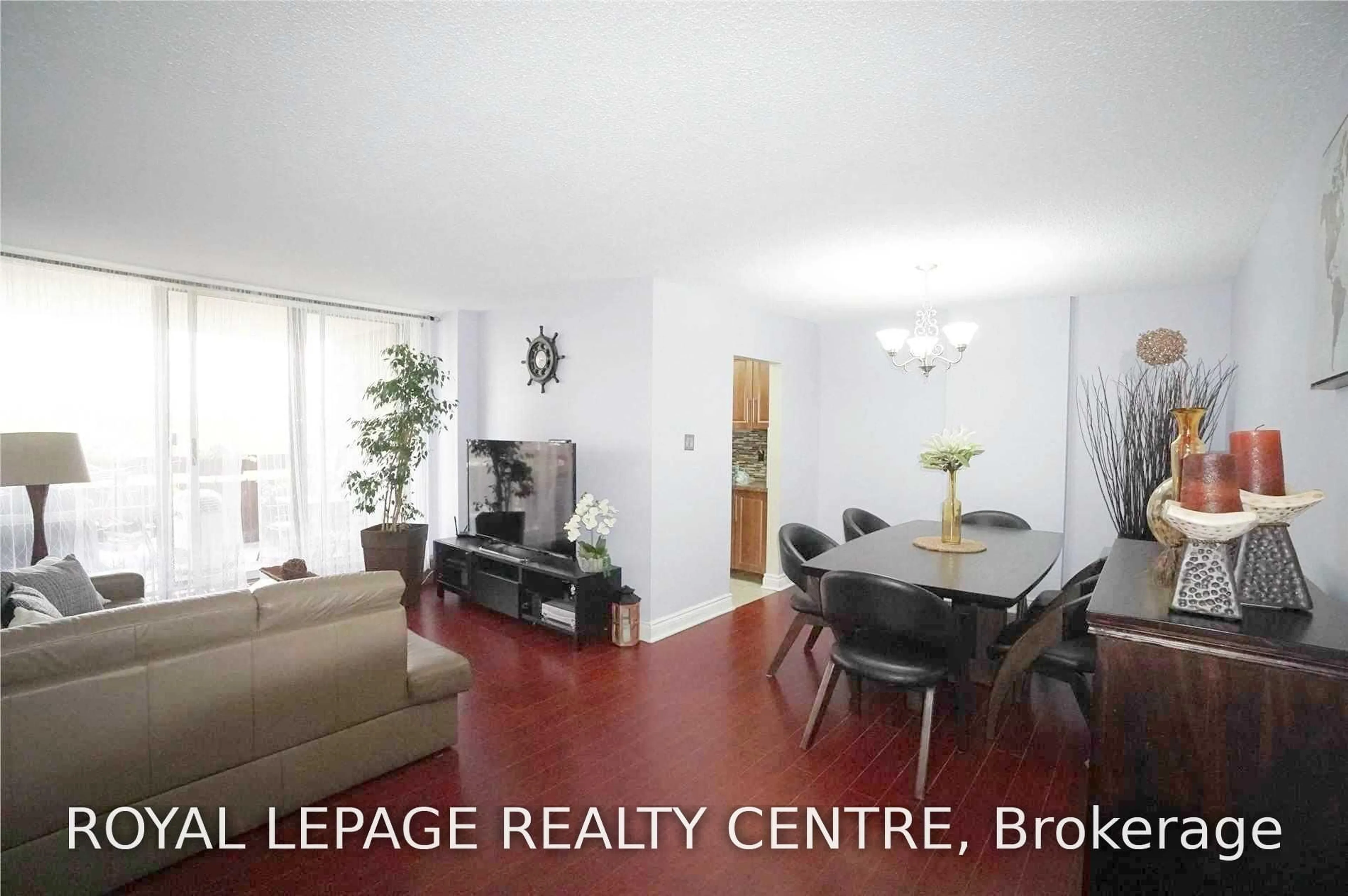 Living room with furniture, wood/laminate floor for 1615 Bloor St #504, Mississauga Ontario L4X 1S2