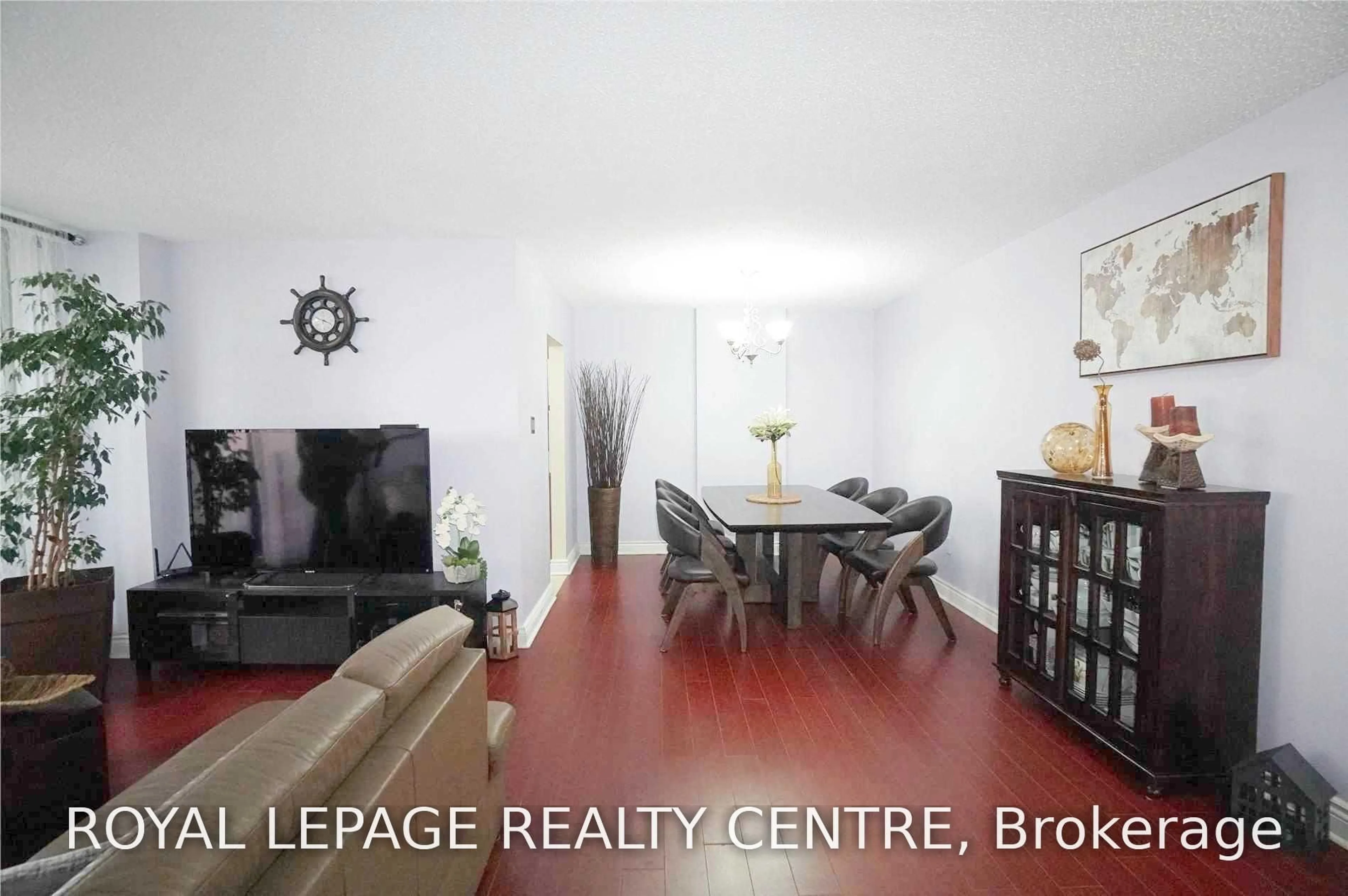 Living room with furniture, wood/laminate floor for 1615 Bloor St #504, Mississauga Ontario L4X 1S2