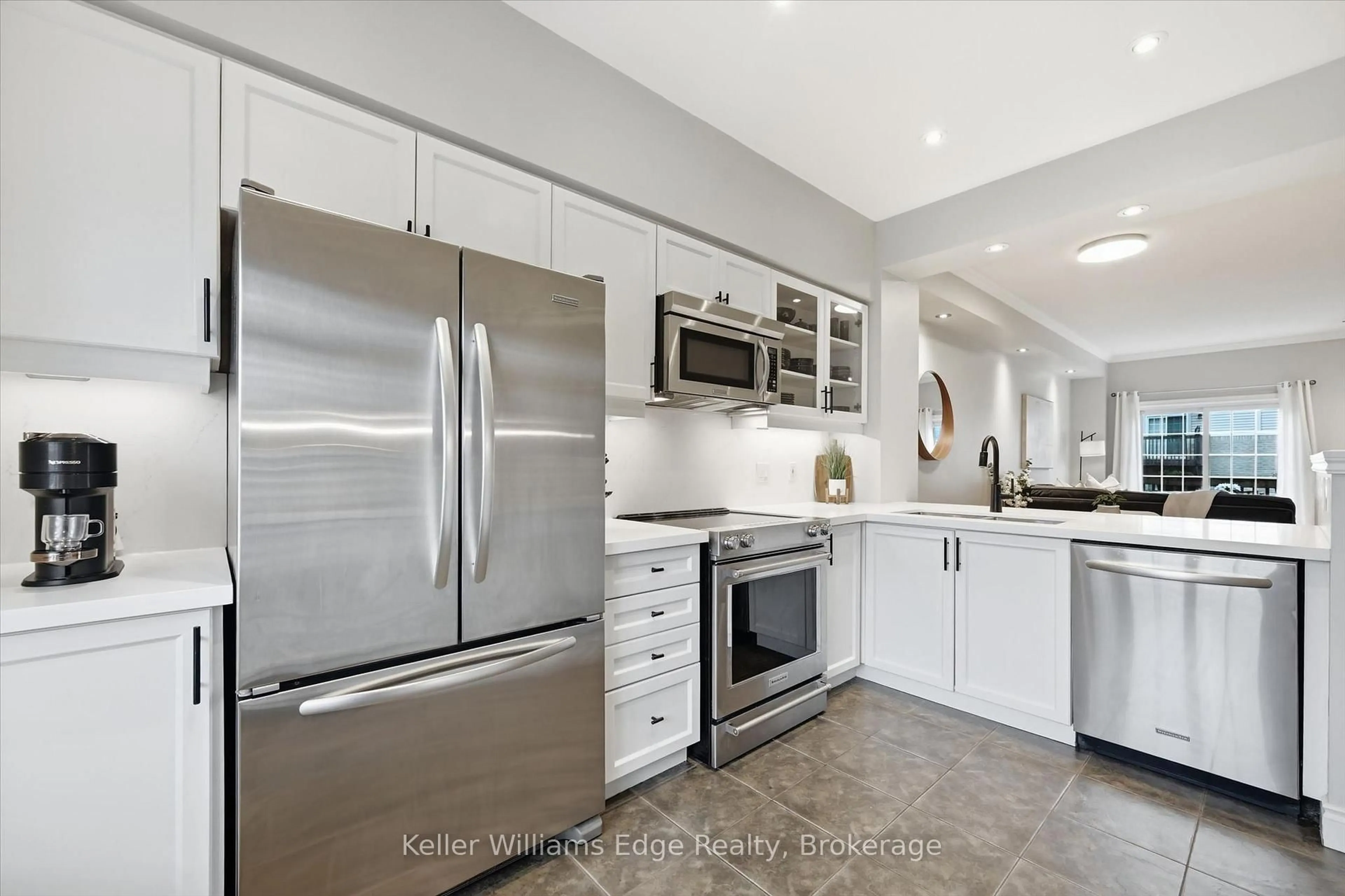 Open concept kitchen, ceramic/tile floor for 5080 Fairview St #29, Burlington Ontario L7L 7E9