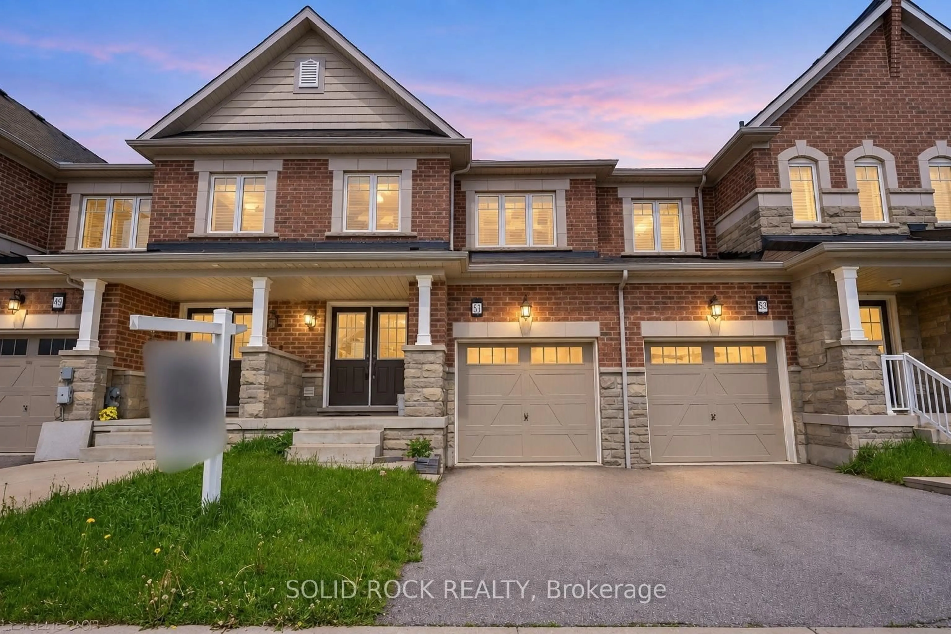 Home with brick exterior material, street for 457 Queen Mary Dr, Brampton Ontario L7A 4L2