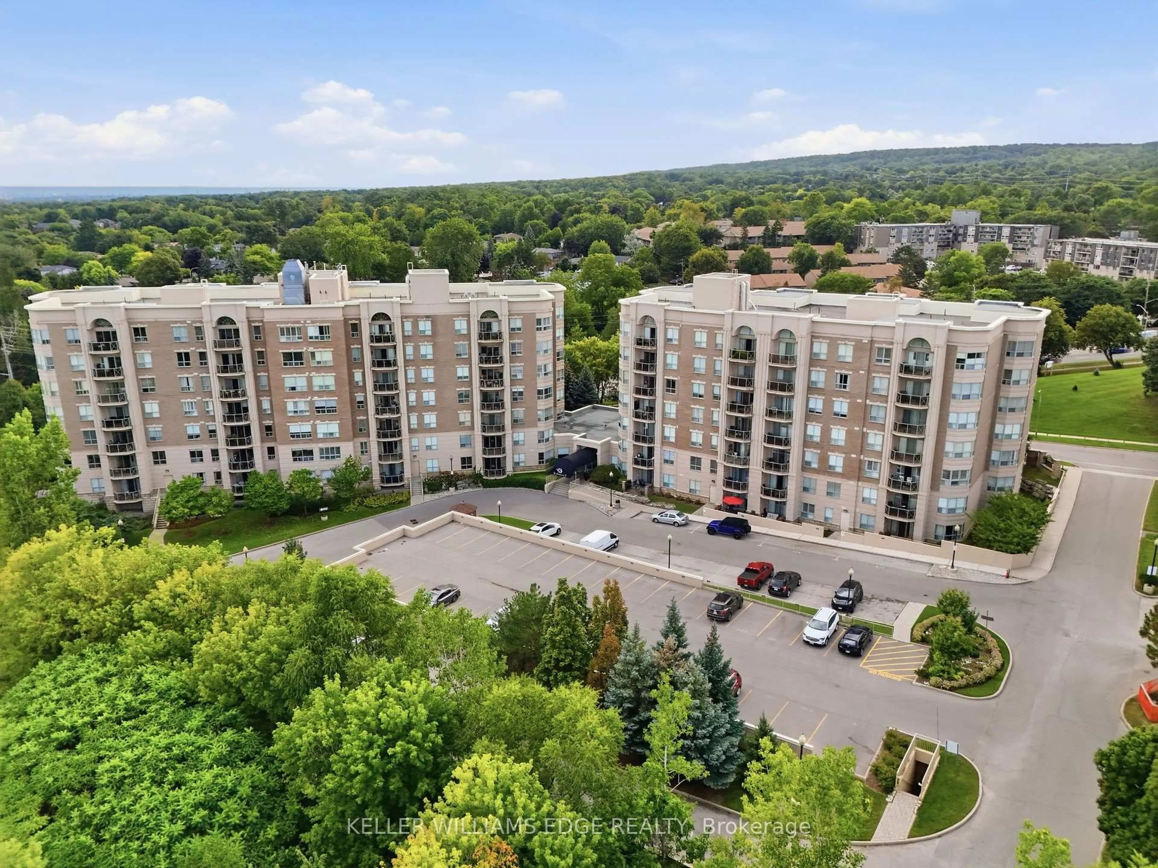 A pic from outside/outdoor area/front of a property/back of a property/a pic from drone, unknown for 2085 Amherst Heights Dr #613, Burlington Ontario L7P 5C2