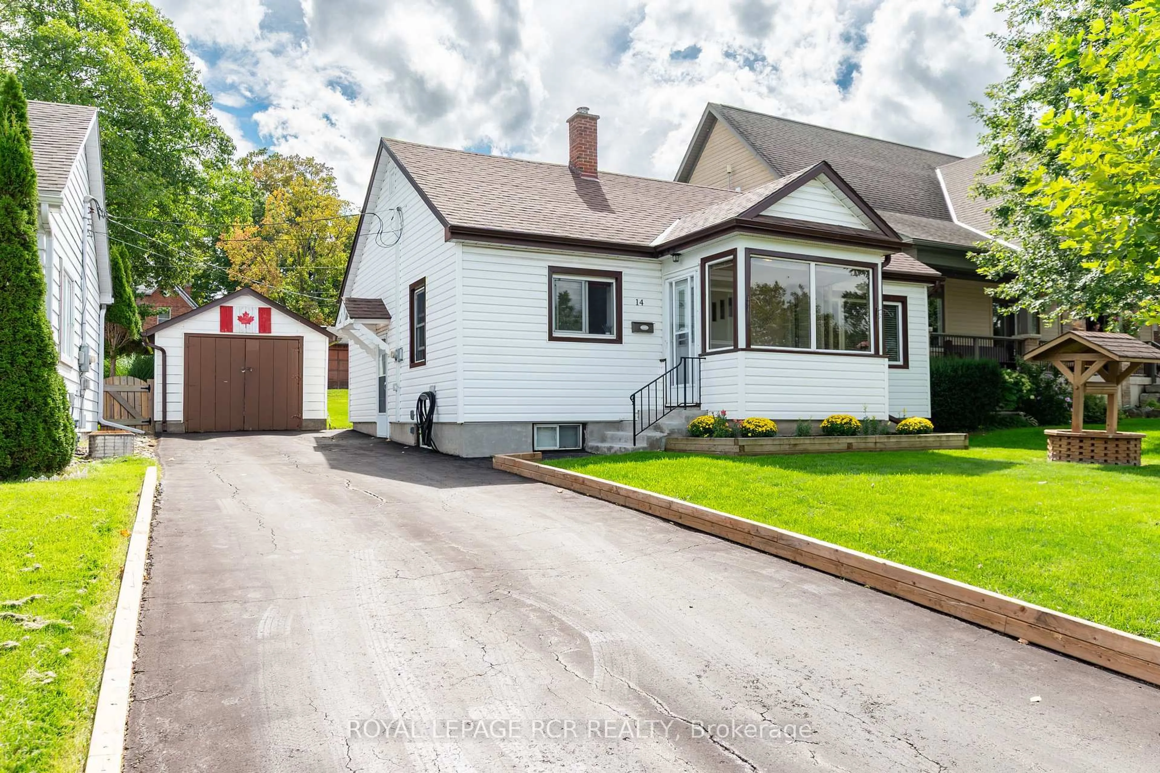 Home with vinyl exterior material, street for 14 Elizabeth St, Orangeville Ontario L9W 1B9