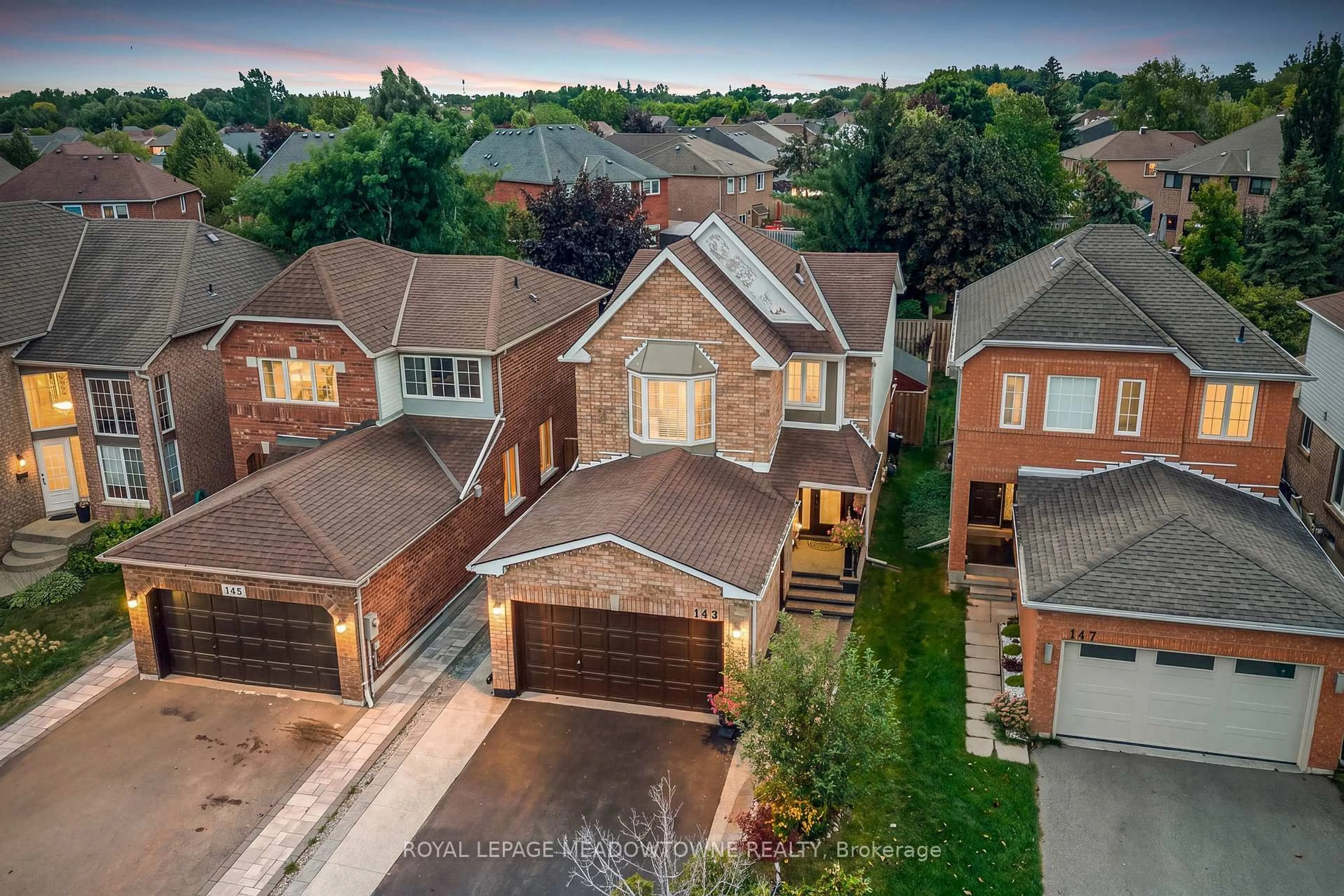 A pic from outside/outdoor area/front of a property/back of a property/a pic from drone, street for 145 Eaton St, Halton Hills Ontario L7G 5V5