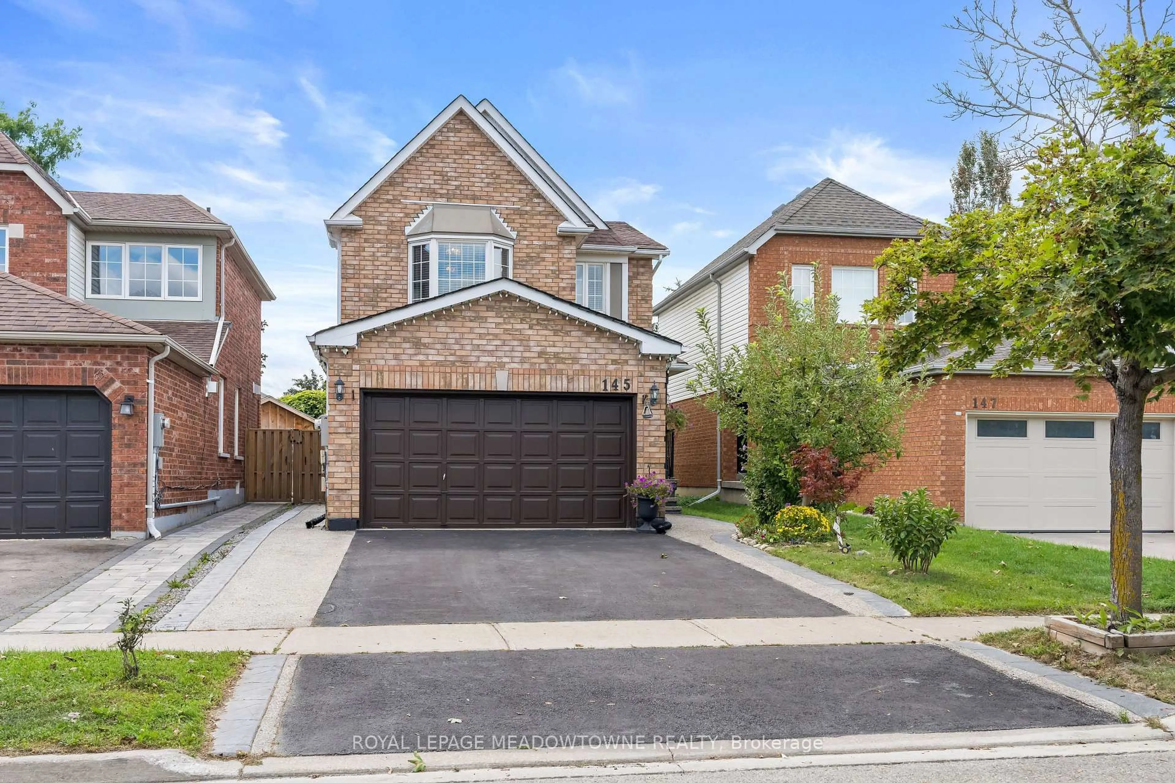 Home with brick exterior material, street for 145 Eaton St, Halton Hills Ontario L7G 5V5