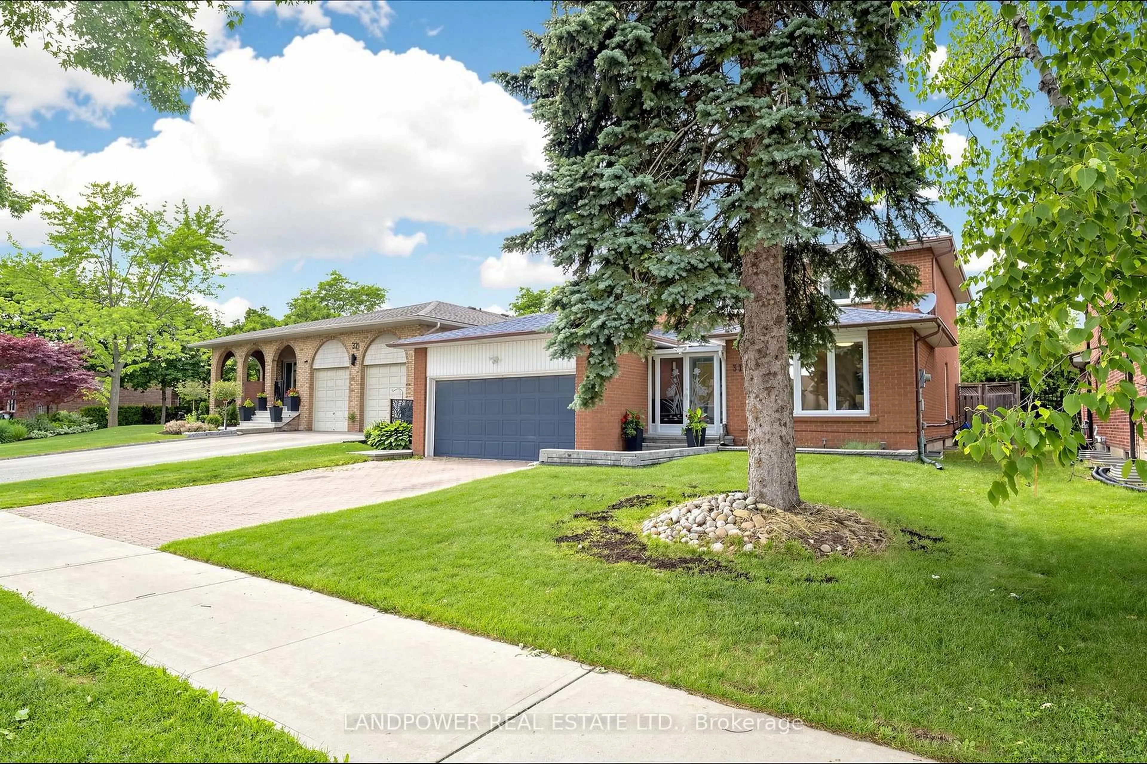 Home with brick exterior material, street for 317 Paisley Blvd, Mississauga Ontario L5B 2S7