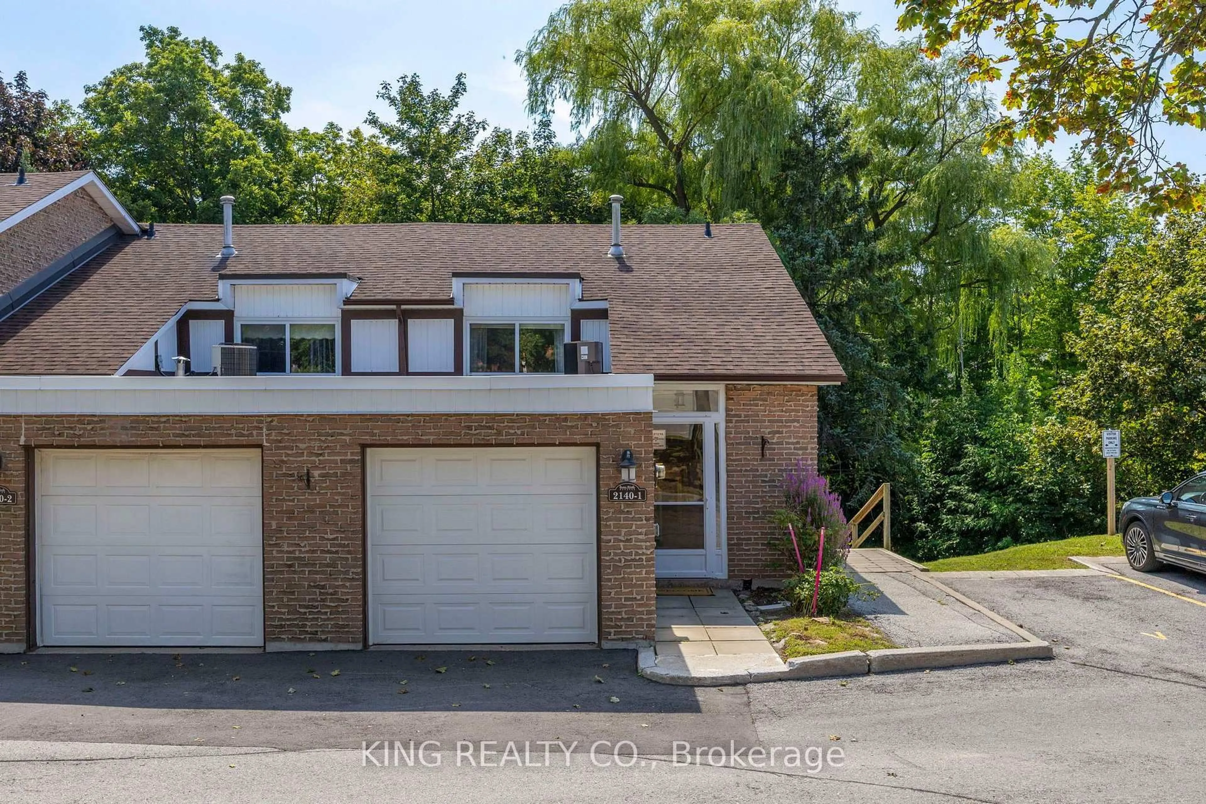 A pic from outside/outdoor area/front of a property/back of a property/a pic from drone, street for 2140 Upper Middle Rd #1, Burlington Ontario L7P 2Z8