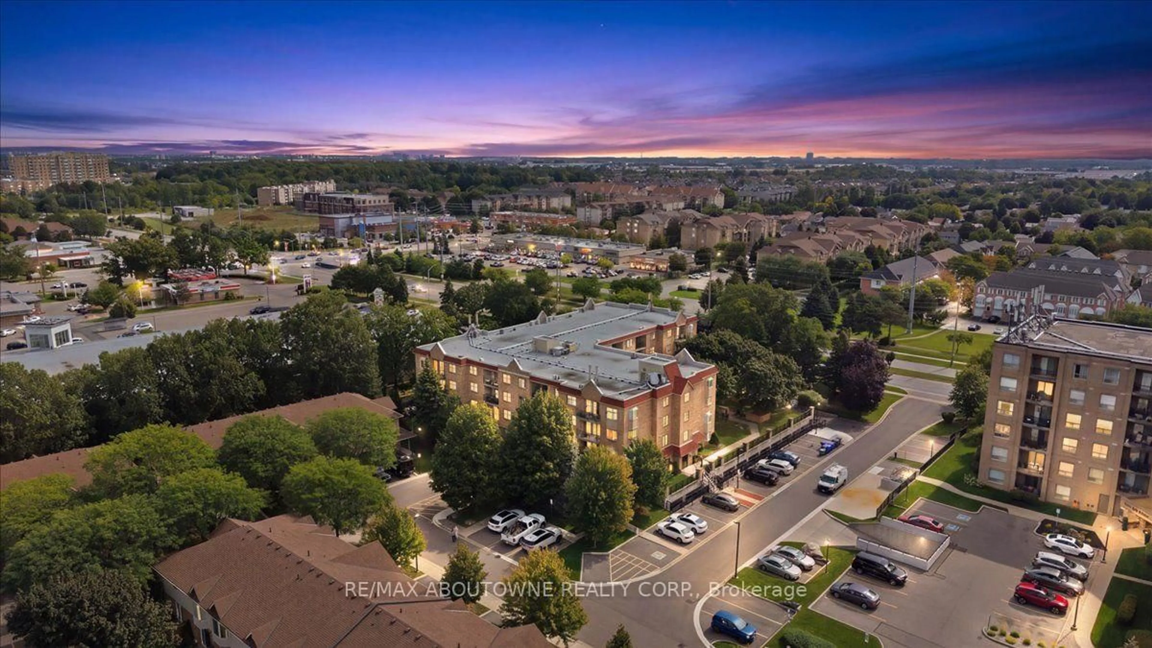 A pic from outside/outdoor area/front of a property/back of a property/a pic from drone, city buildings view from balcony for 3499 Upper Middle Rd #203, Burlington Ontario L7M 4M7