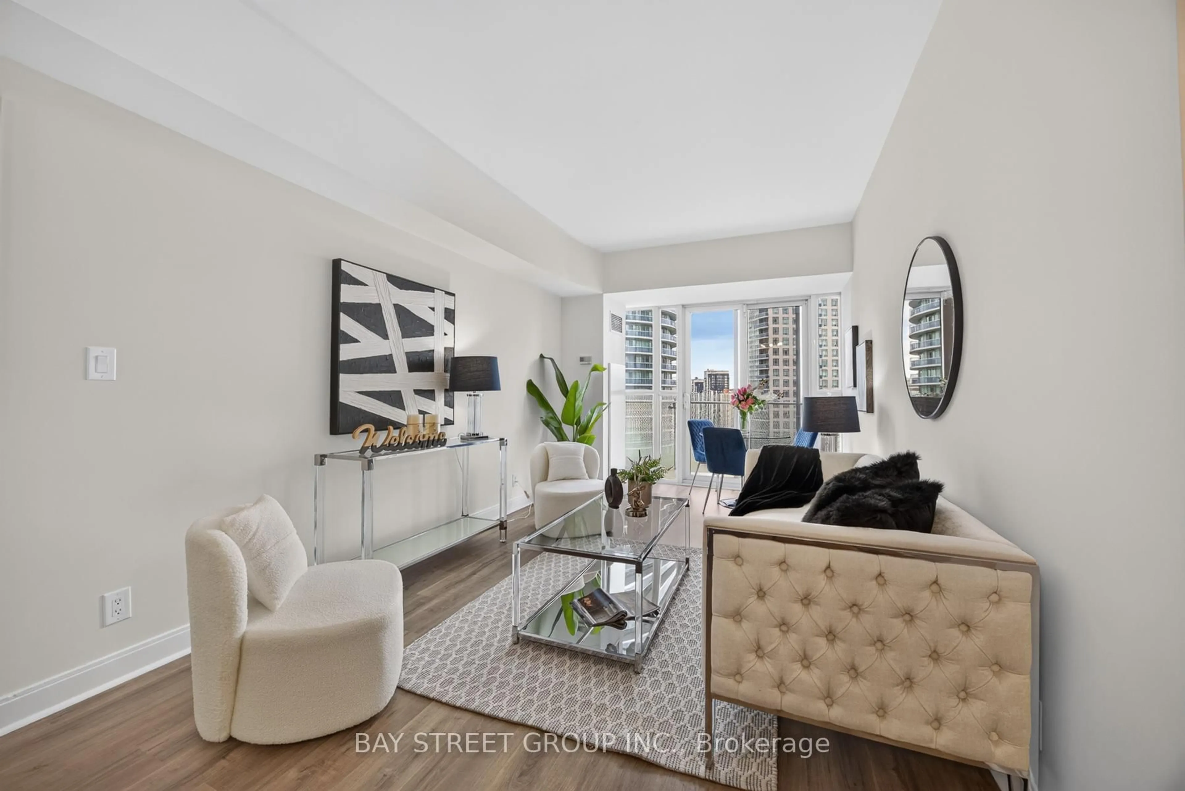 Living room with furniture, unknown for 50 Absolute Ave #1302, Mississauga Ontario L4Z 0A9
