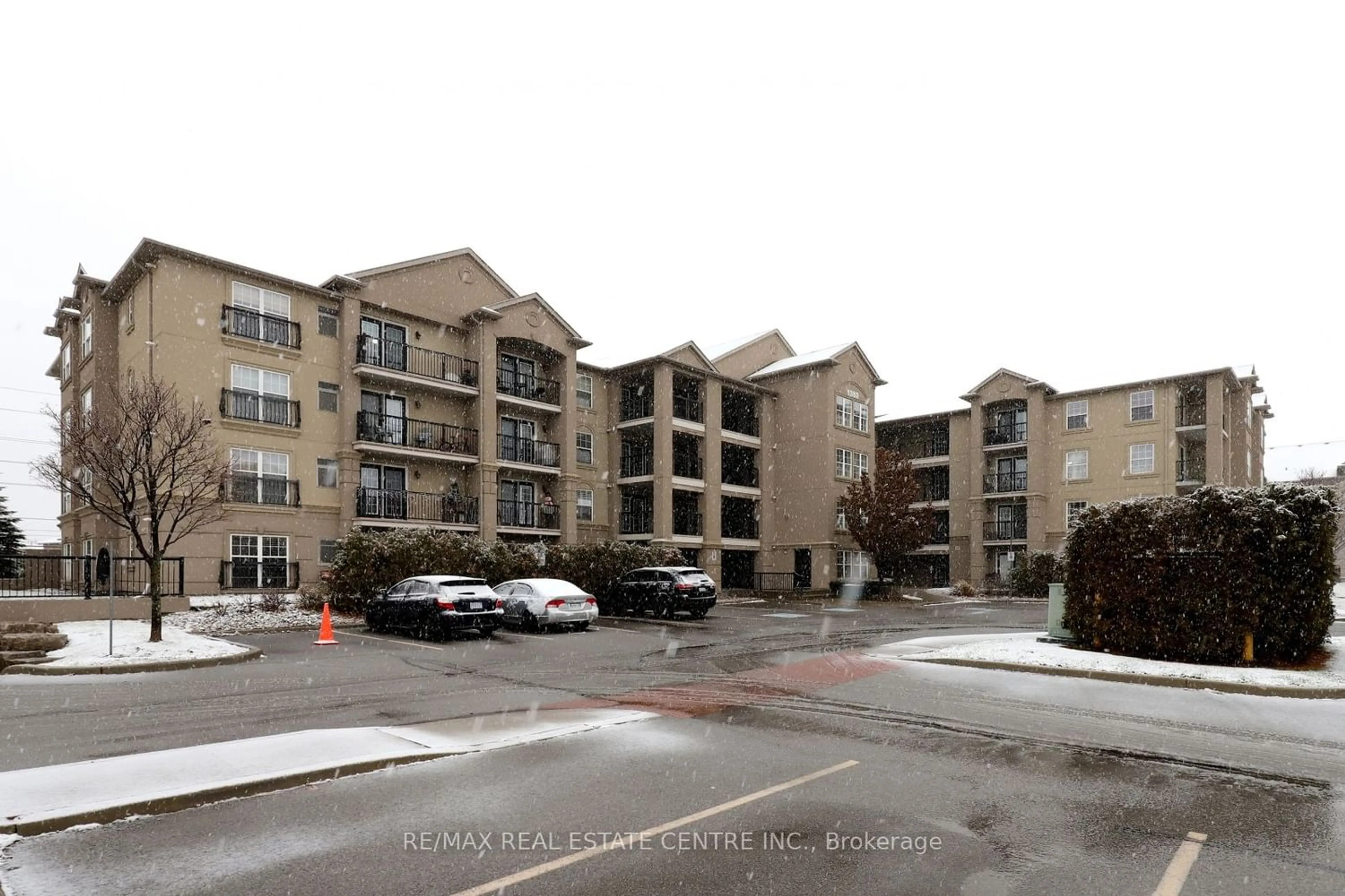 A pic from exterior of the house or condo for 1380 Main St #409, Milton Ontario L9T 7S4