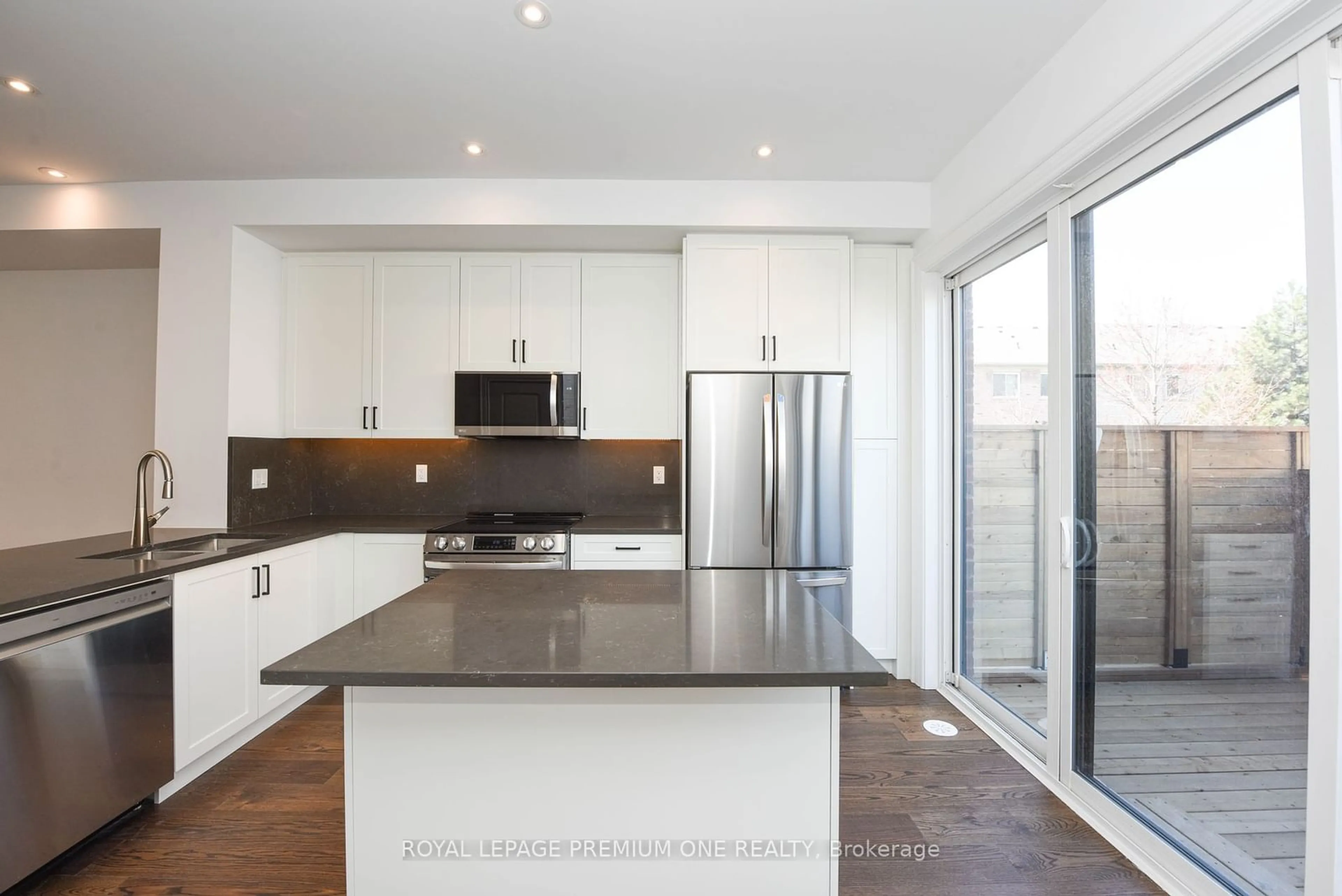 Contemporary kitchen, wood floors for 60 Lunar Cres #179, Mississauga Ontario L5M 2R4