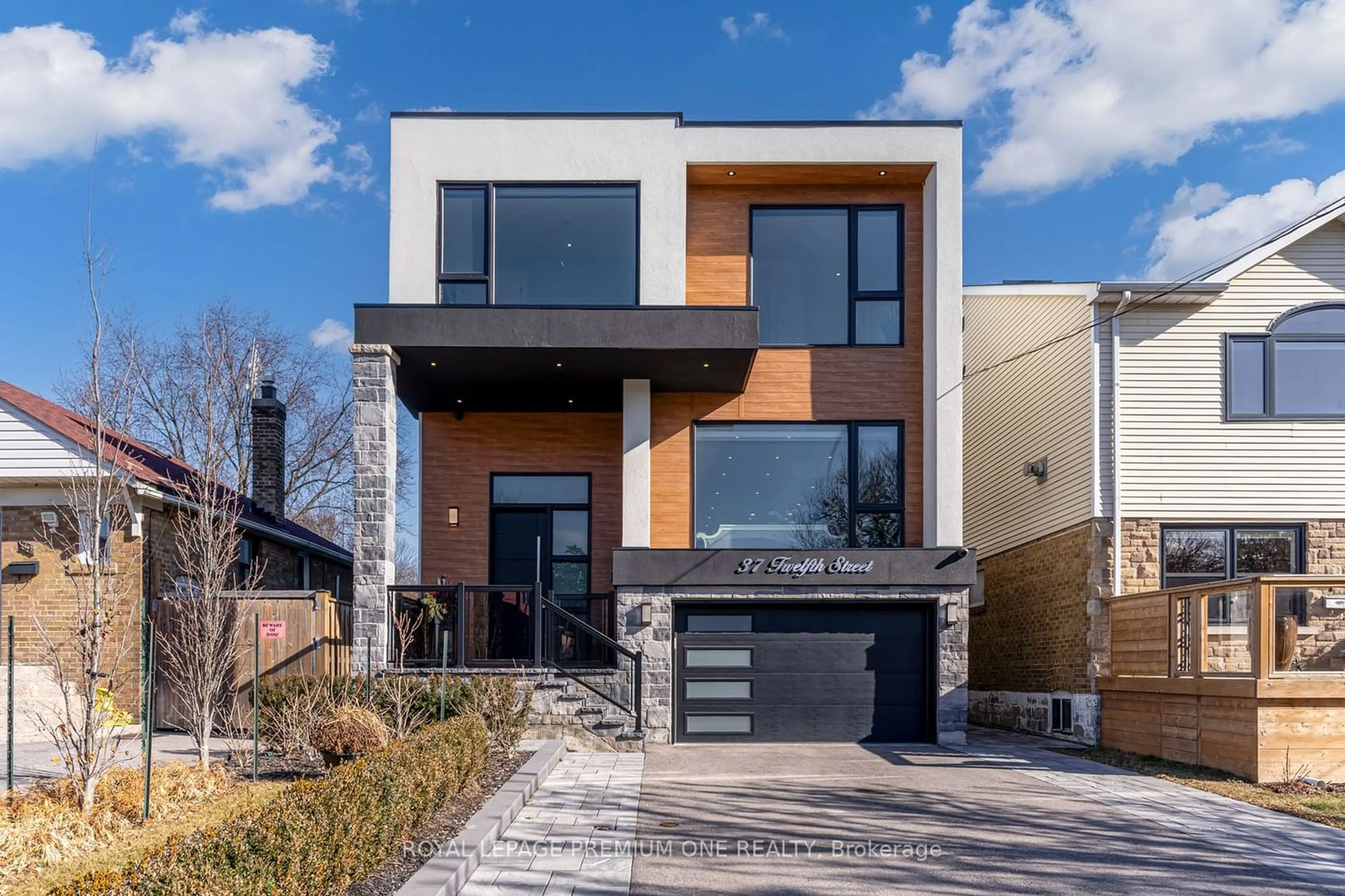 Home with stone exterior material for 37 12th St, Toronto Ontario M8V 3G8