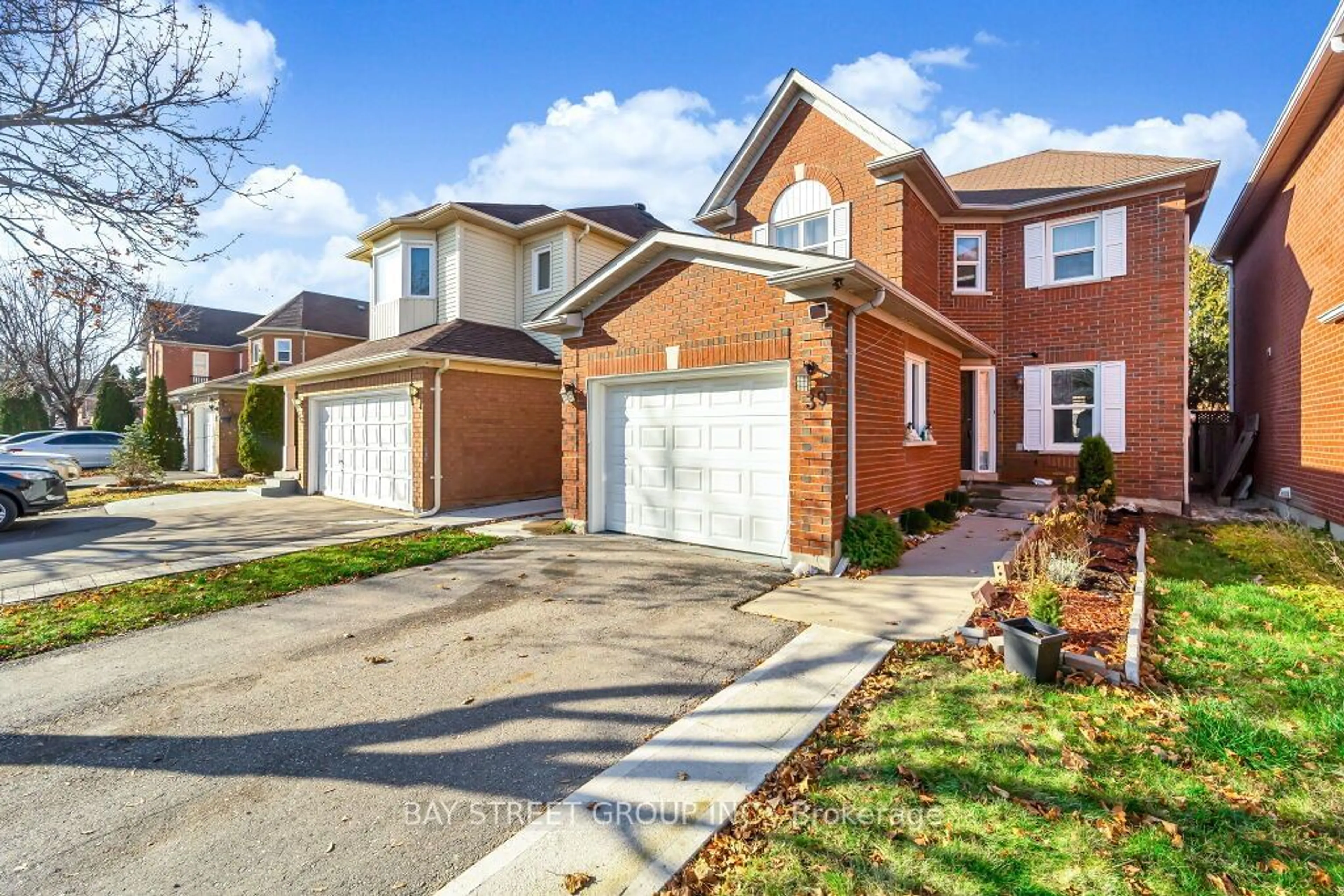 Home with brick exterior material for 39 Blue Spruce St, Brampton Ontario L6R 1C4