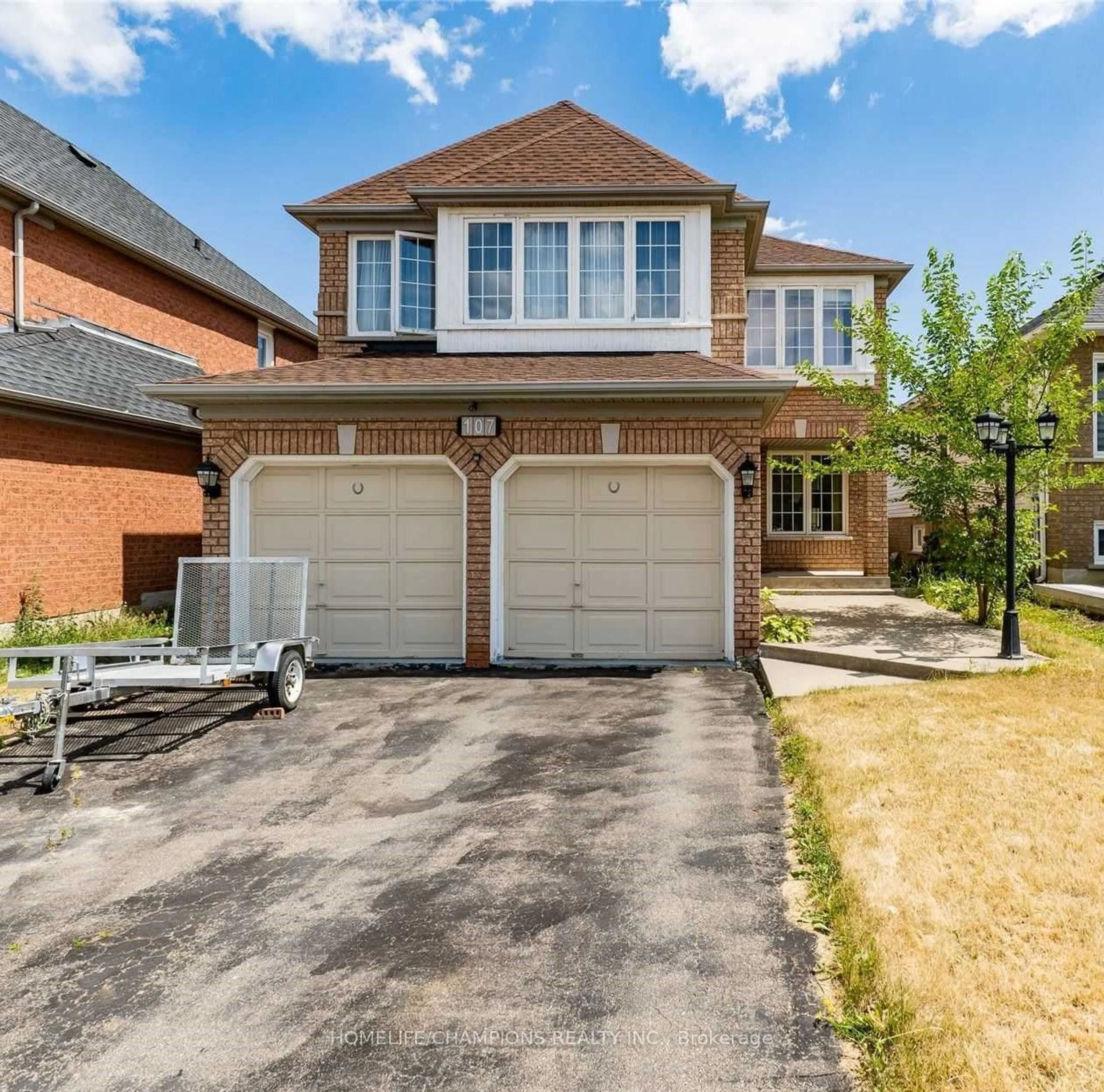 Frontside or backside of a home for 107 Seclusion Cres, Brampton Ontario L6R 1K8