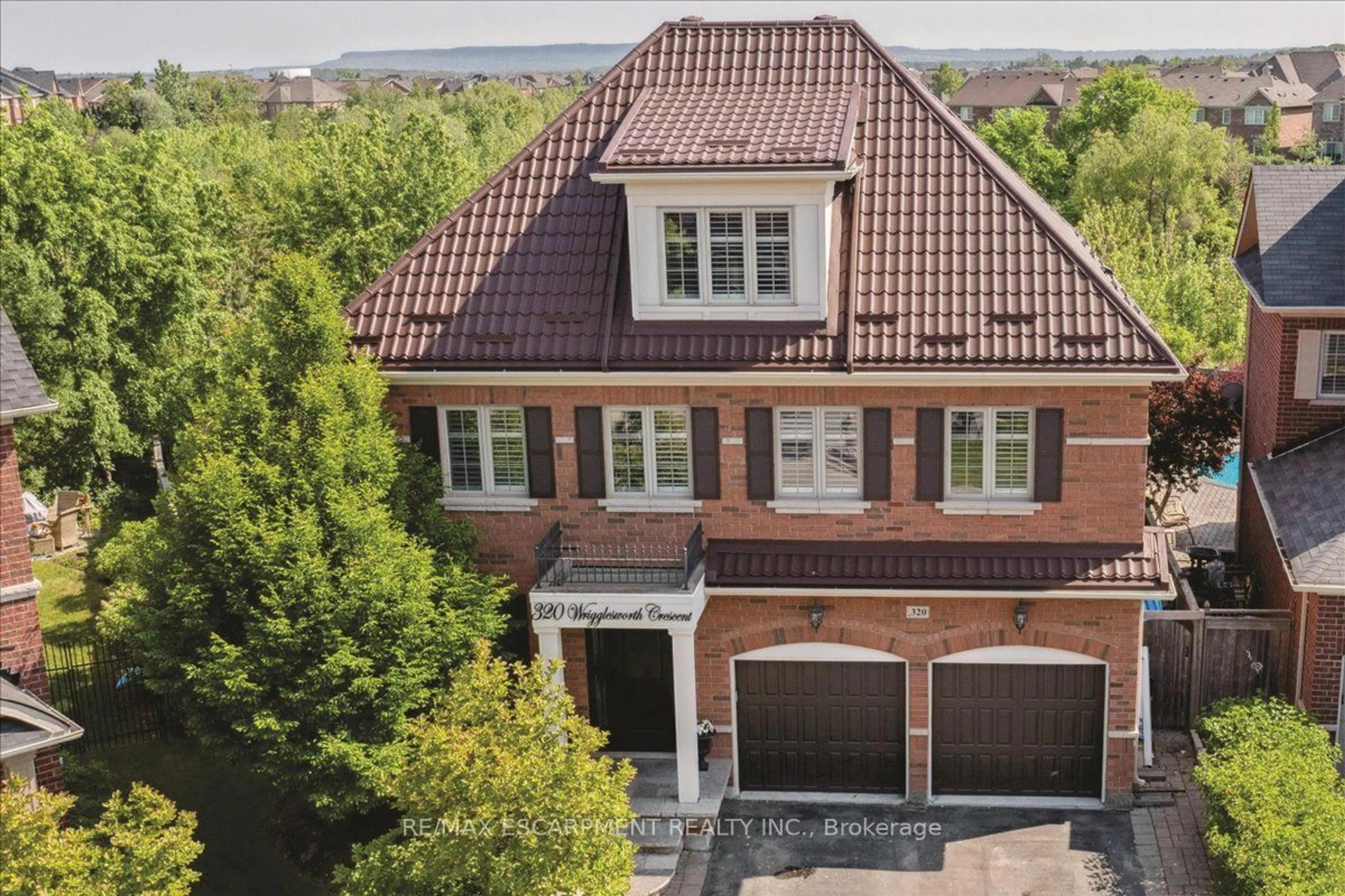 Home with brick exterior material for 320 Wrigglesworth Cres, Milton Ontario L9T 6Z9