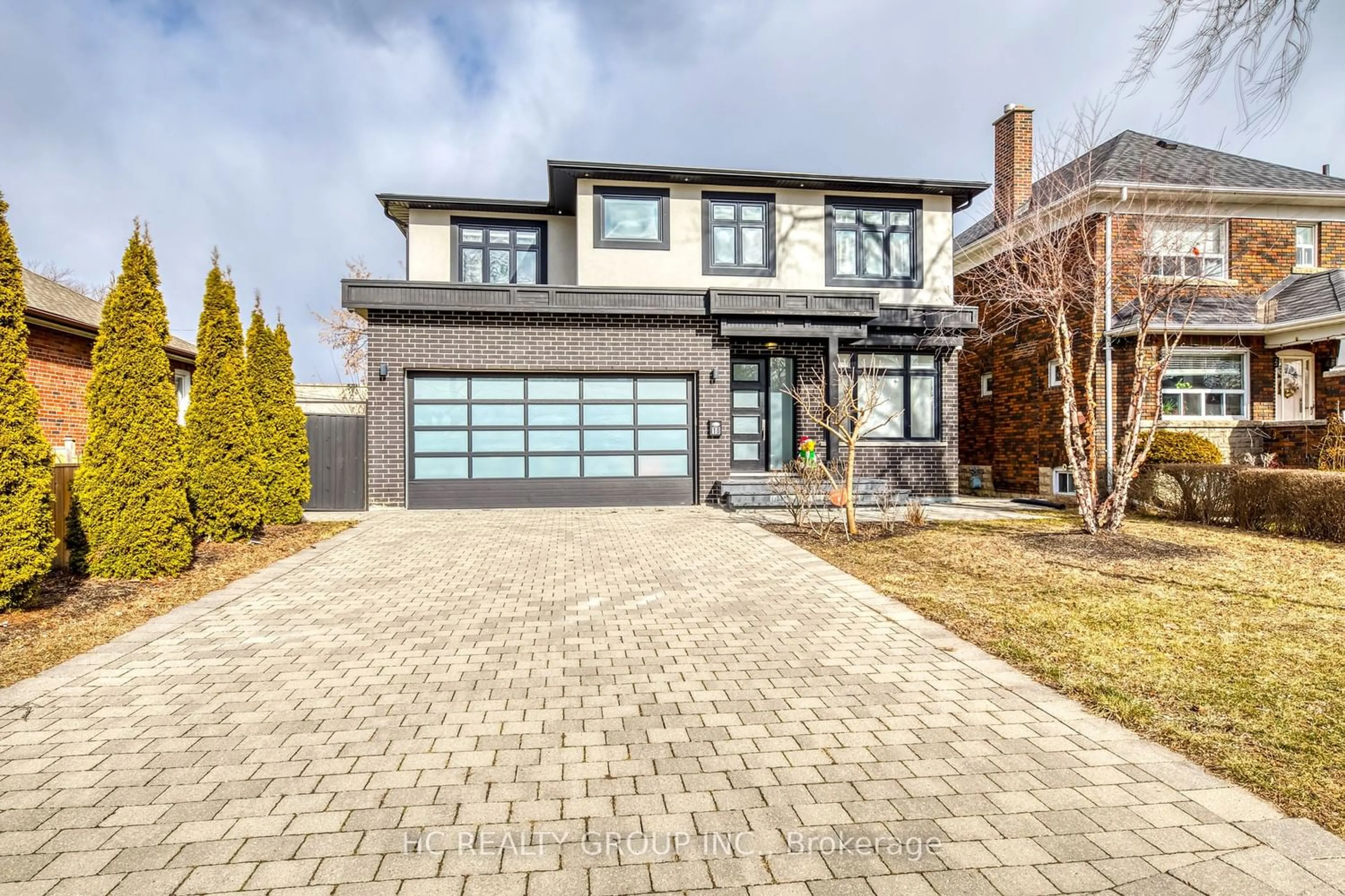 Home with brick exterior material for 18 Ash Cres, Toronto Ontario M8W 1E3