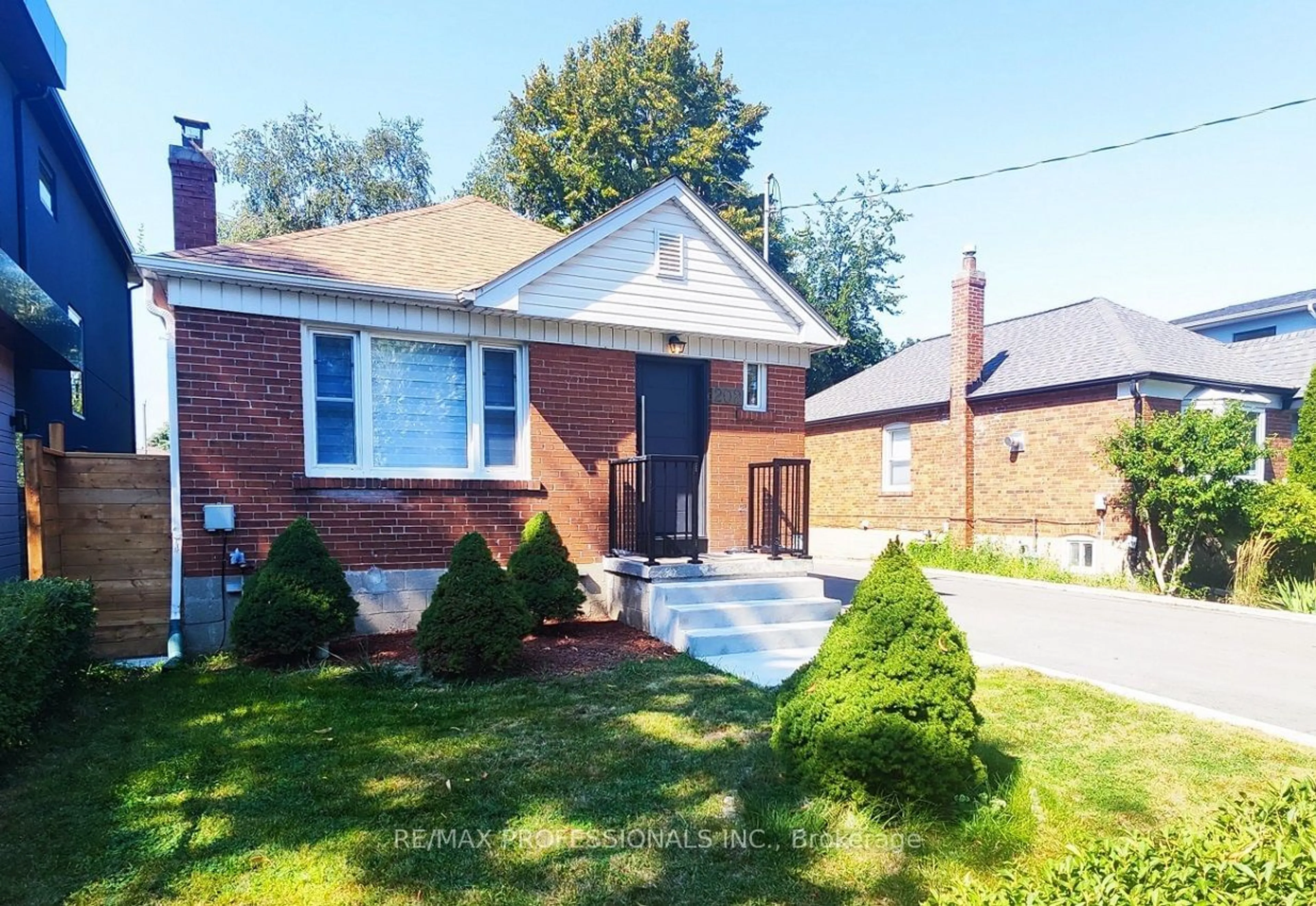 Home with brick exterior material for 202 Gamma St, Toronto Ontario M8W 4G5
