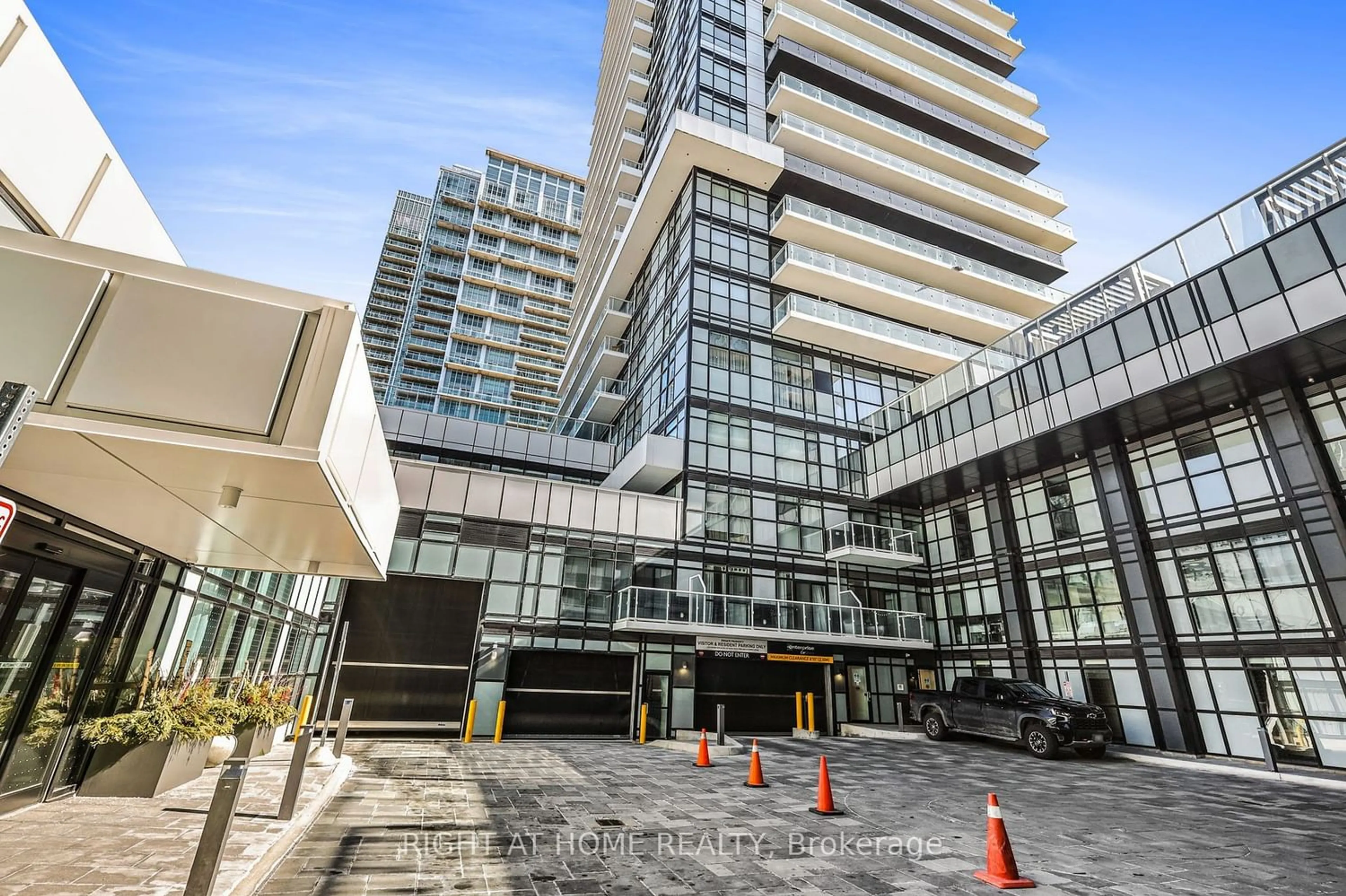 A pic from exterior of the house or condo for 251 Manitoba St #203, Toronto Ontario M8Y 0C7