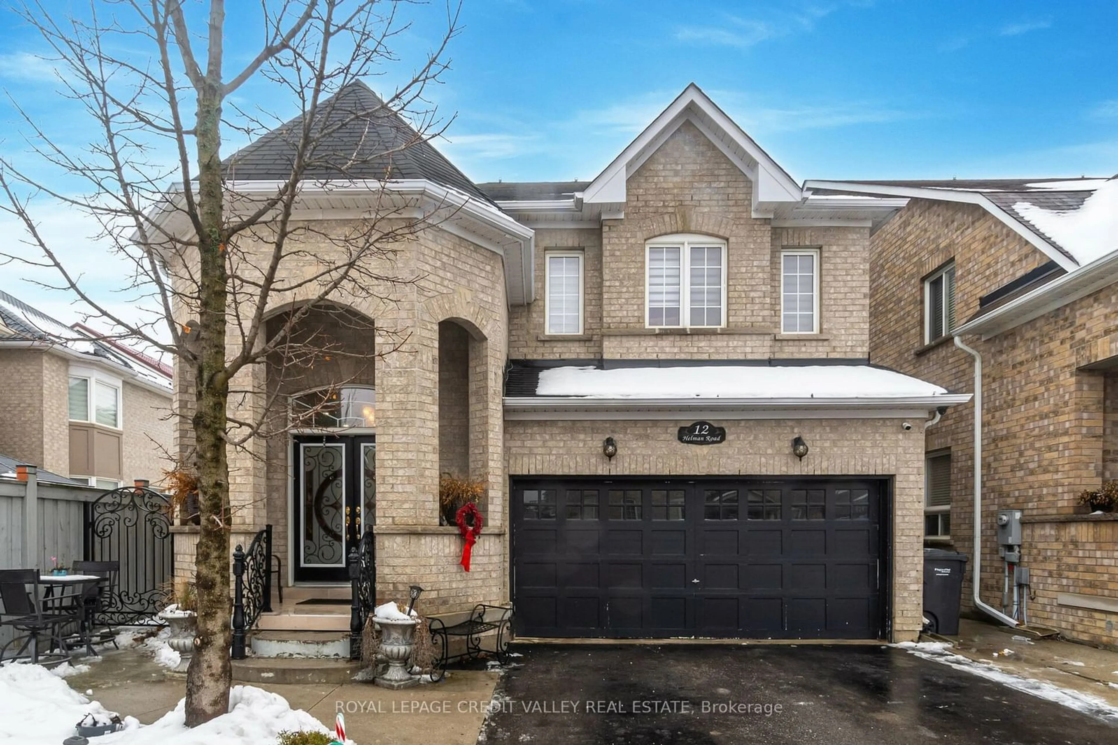 Home with brick exterior material for 12 Helman Rd, Brampton Ontario L6R 0R6