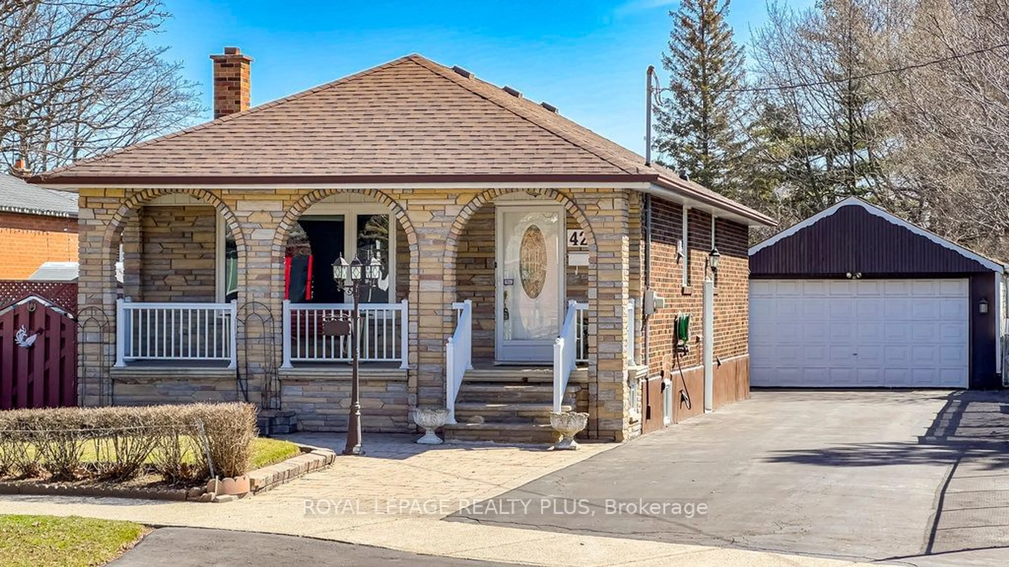 Home with brick exterior material for 429 Lanor Ave, Toronto Ontario M8W 2R9