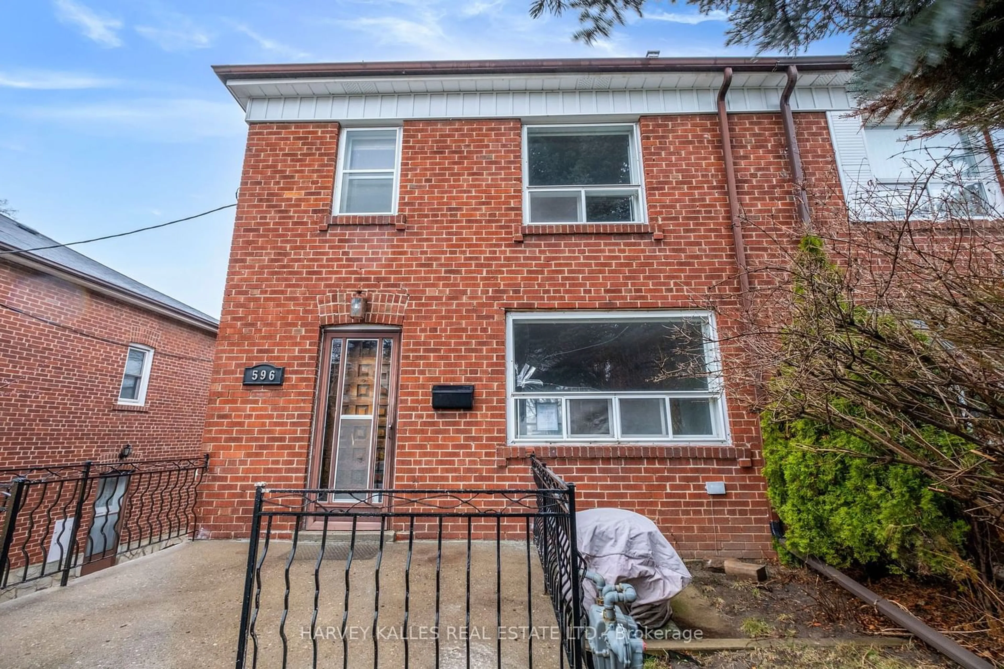 Home with brick exterior material for 596 Mcroberts Ave, Toronto Ontario M6E 4R7