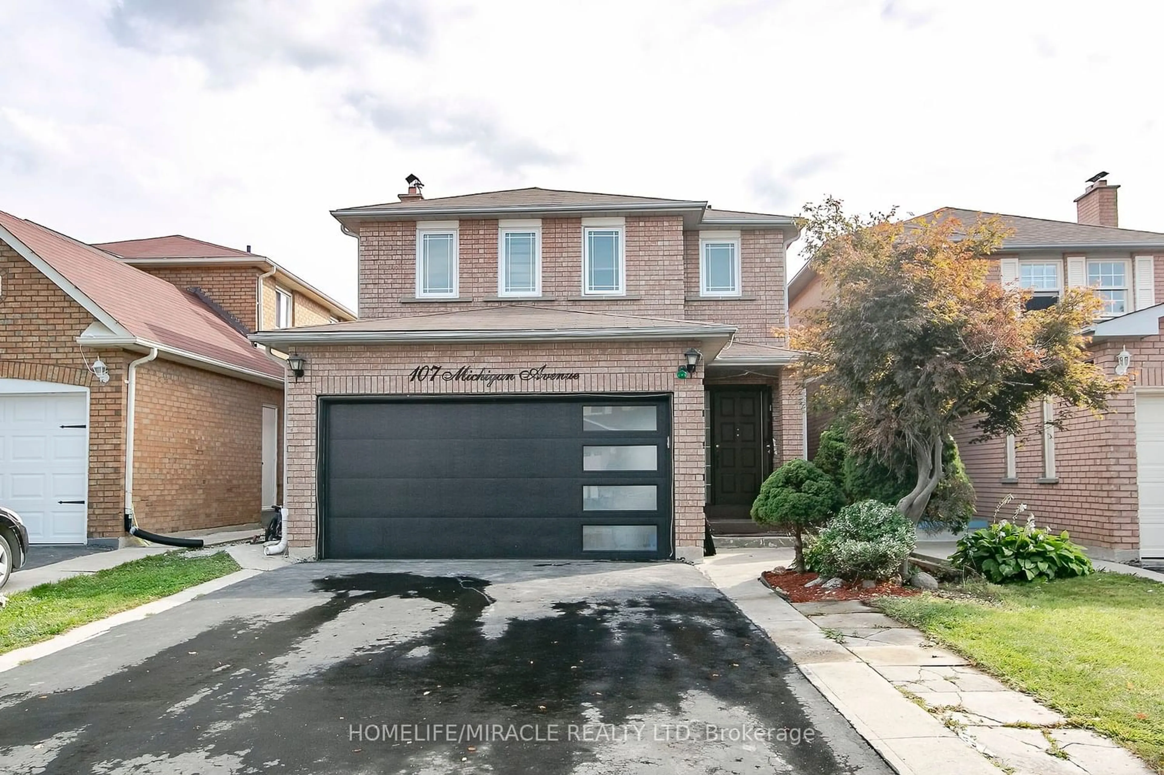 Home with brick exterior material for 107 Michigan Ave, Brampton Ontario L6Y 4N6