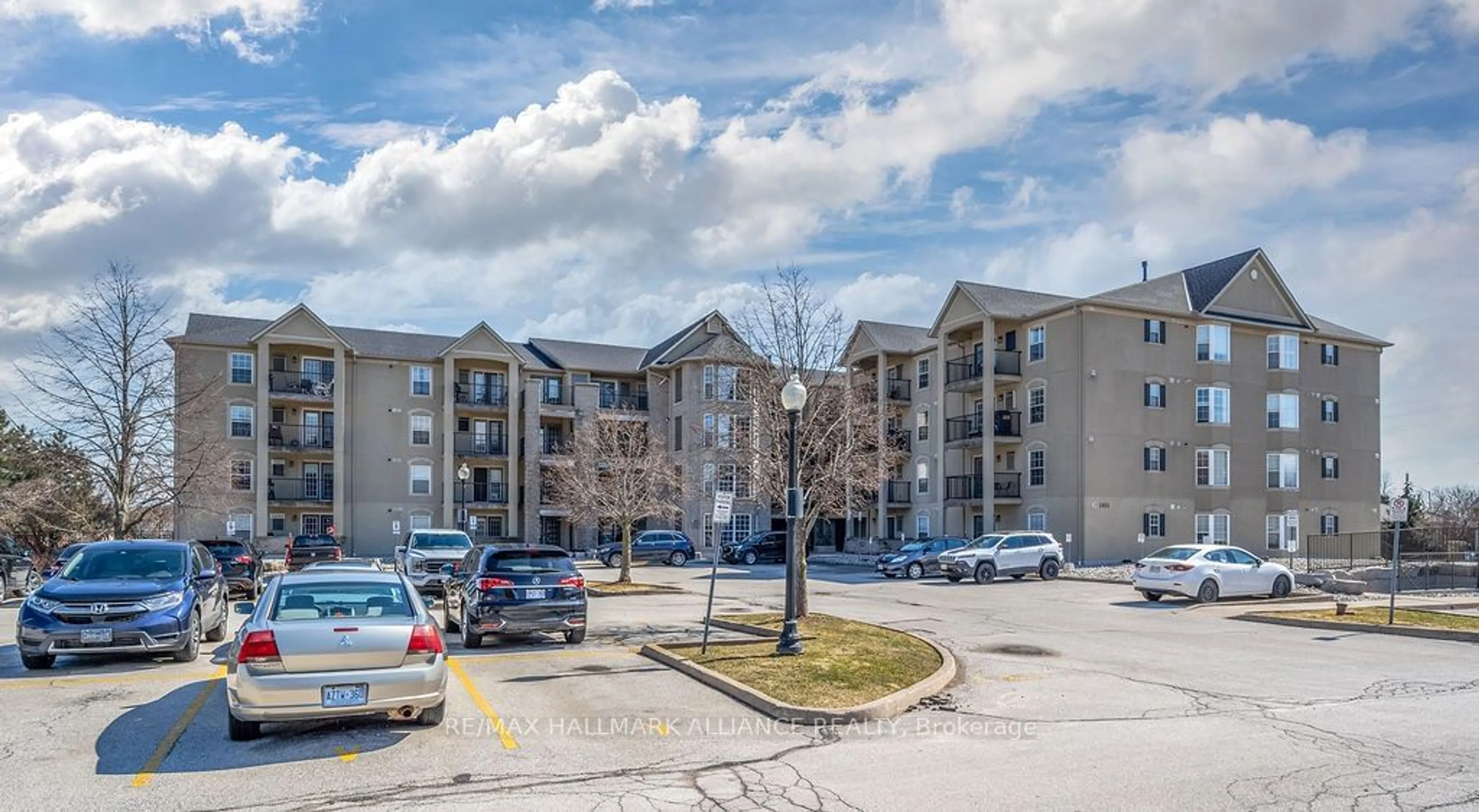 A pic from exterior of the house or condo for 1411 Walker's Line #108, Burlington Ontario L7M 4P4