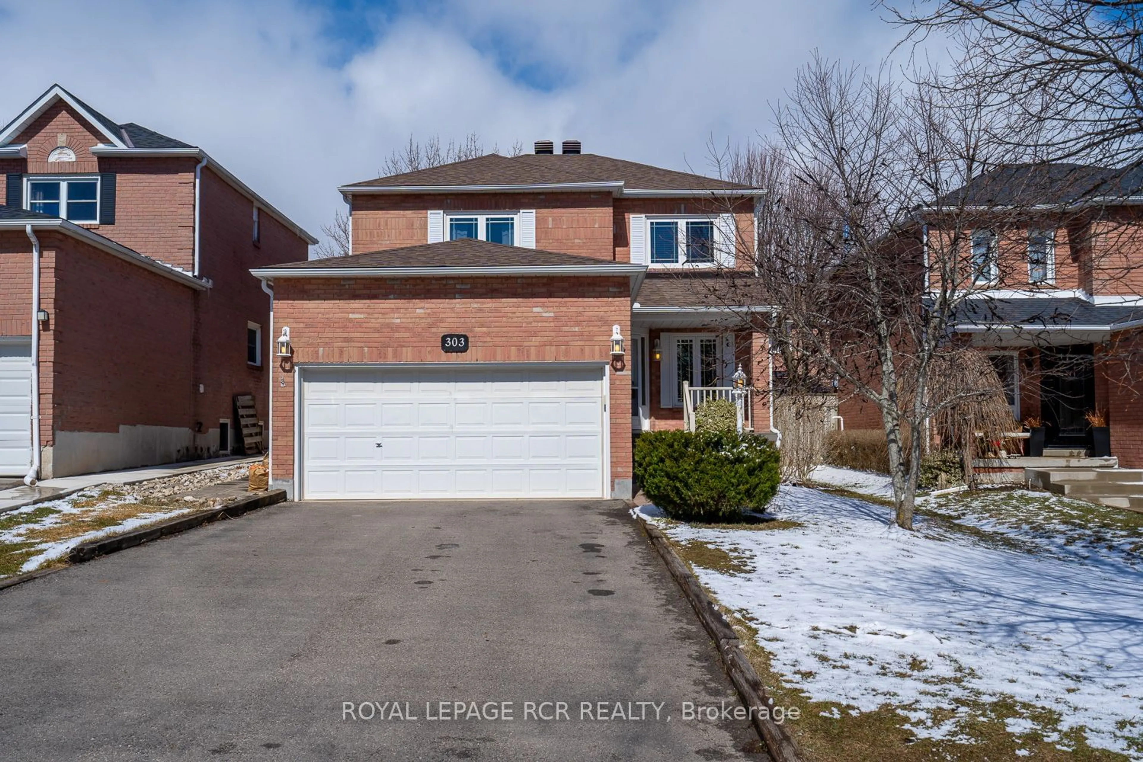 Frontside or backside of a home for 303 Faith Dr, Orangeville Ontario L9W 4P8