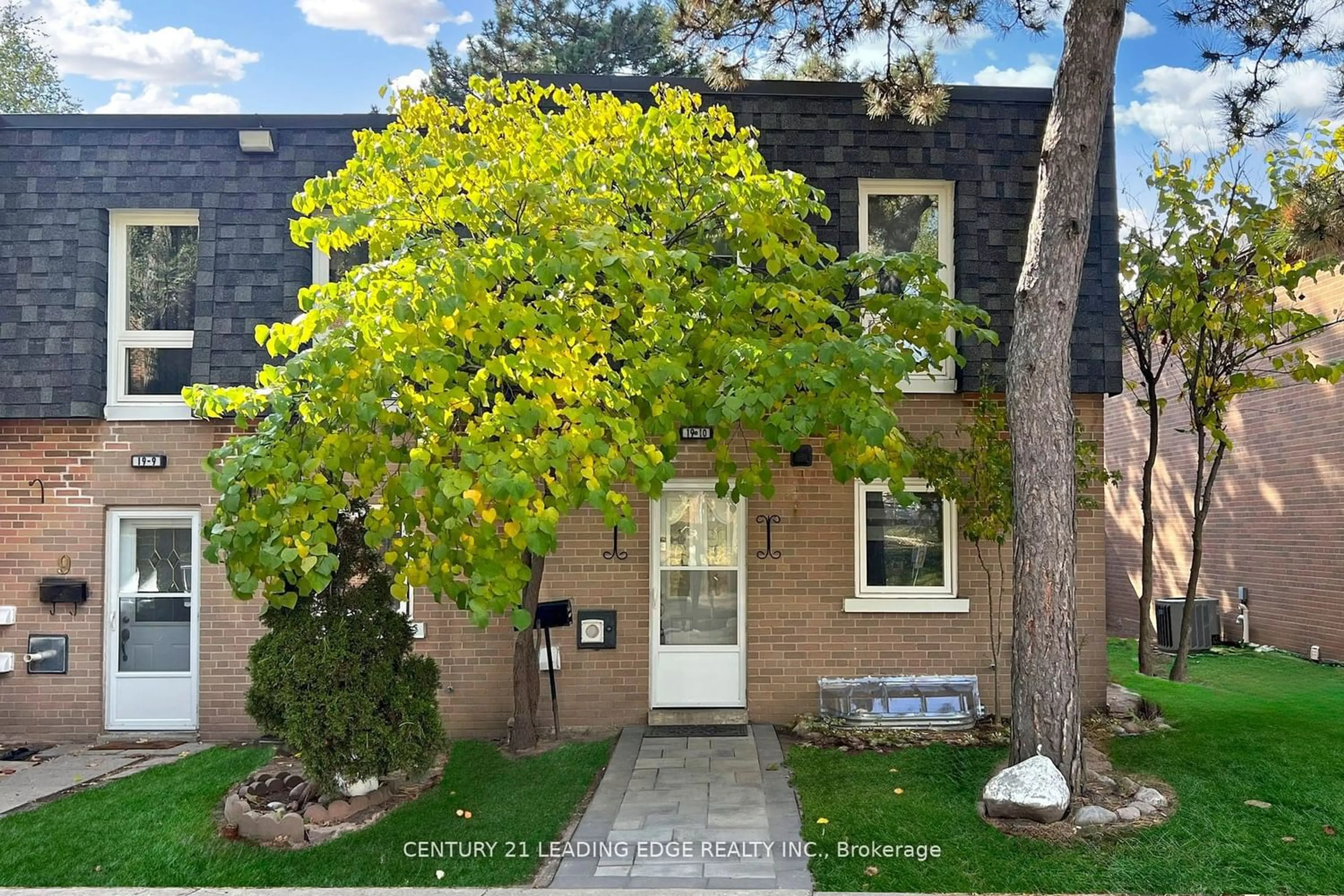 Home with brick exterior material for 19 Derrydown Rd #10, Toronto Ontario M3J 1R2