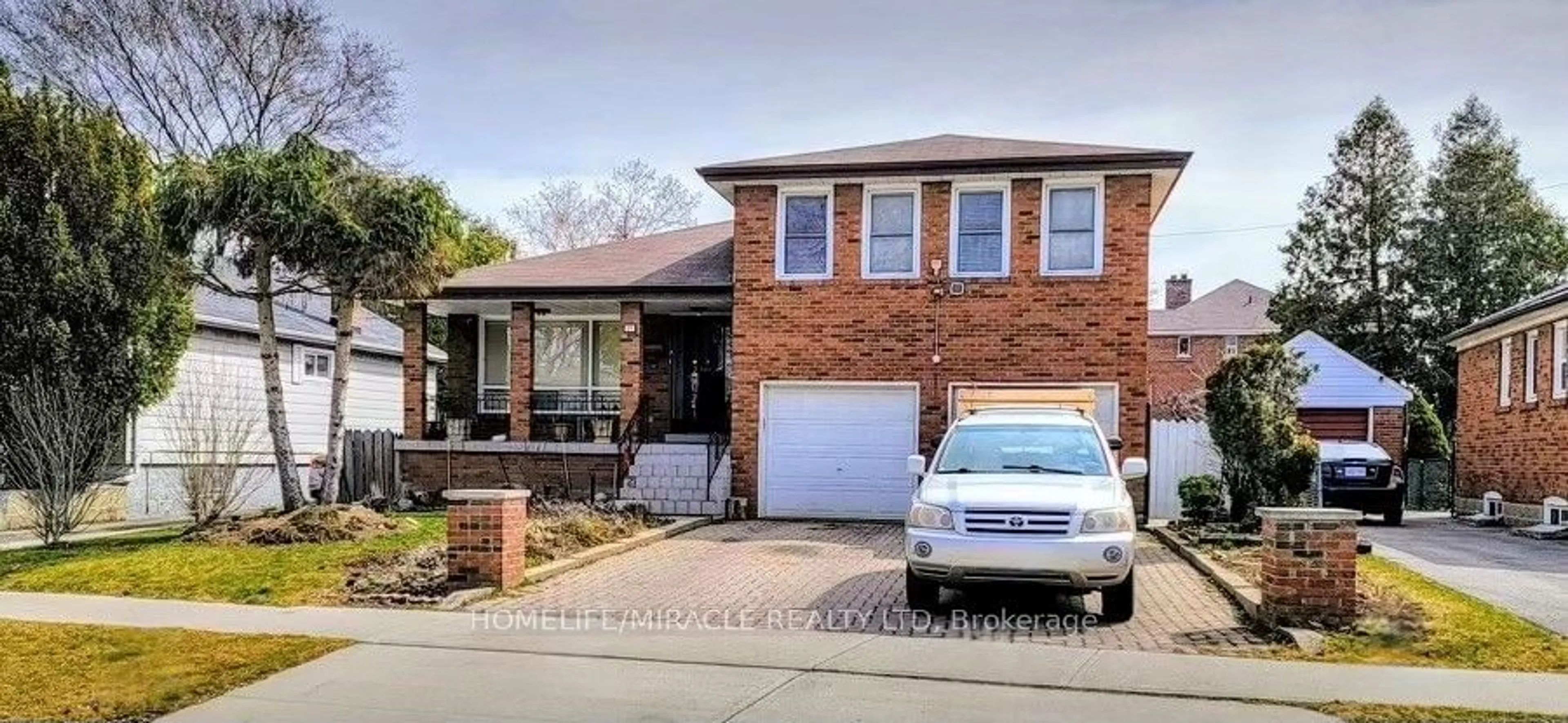 Home with brick exterior material for 21 Pelmo Cres, Toronto Ontario M9N 2X4
