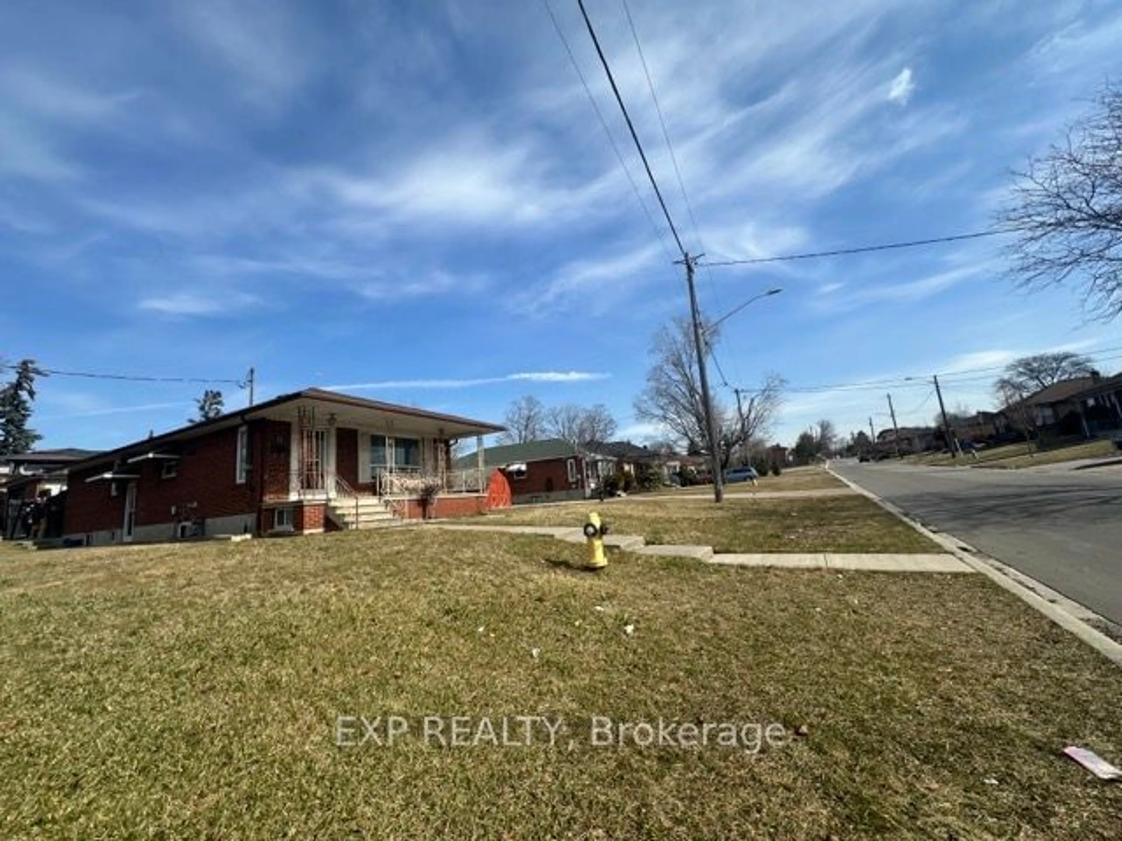 A pic from outside/outdoor area/front of a property/back of a property/a pic from drone, street for 74 William Cragg Dr, Toronto Ontario M3M 1V2