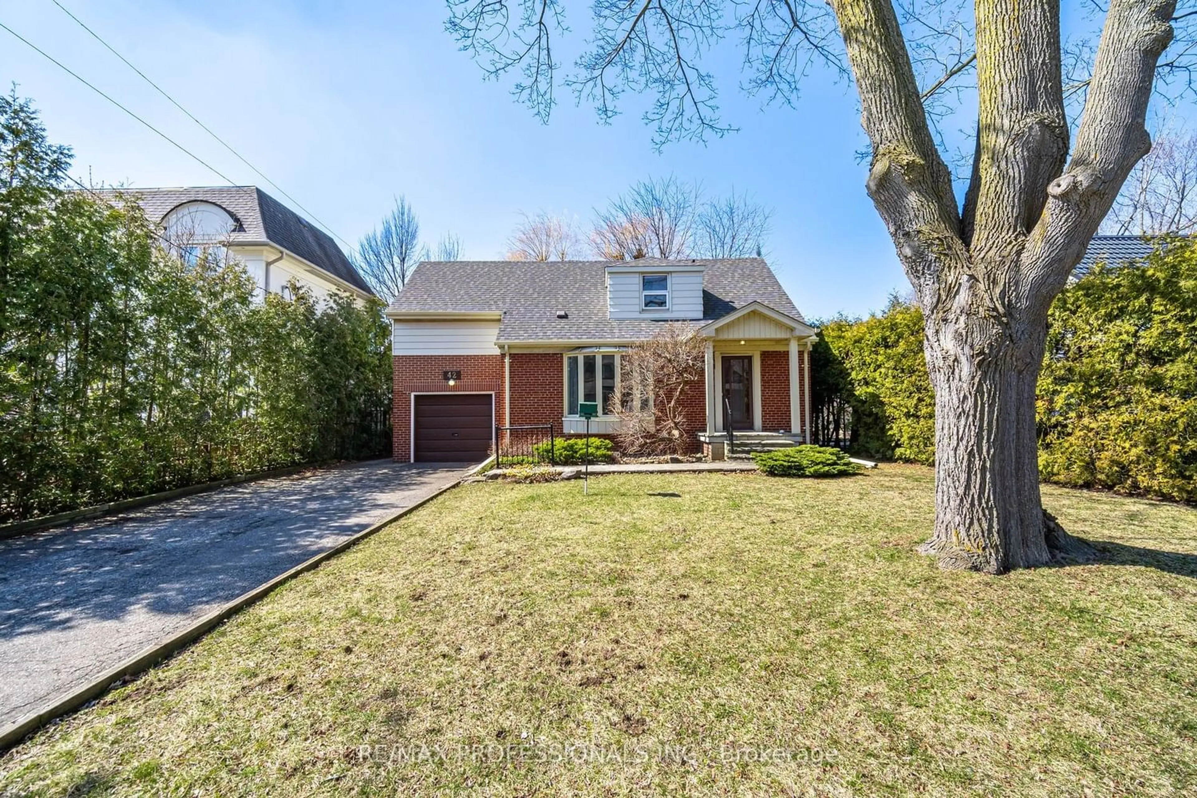 Home with brick exterior material for 42 Chestnut Hills Pkwy, Toronto Ontario M9A 3P6