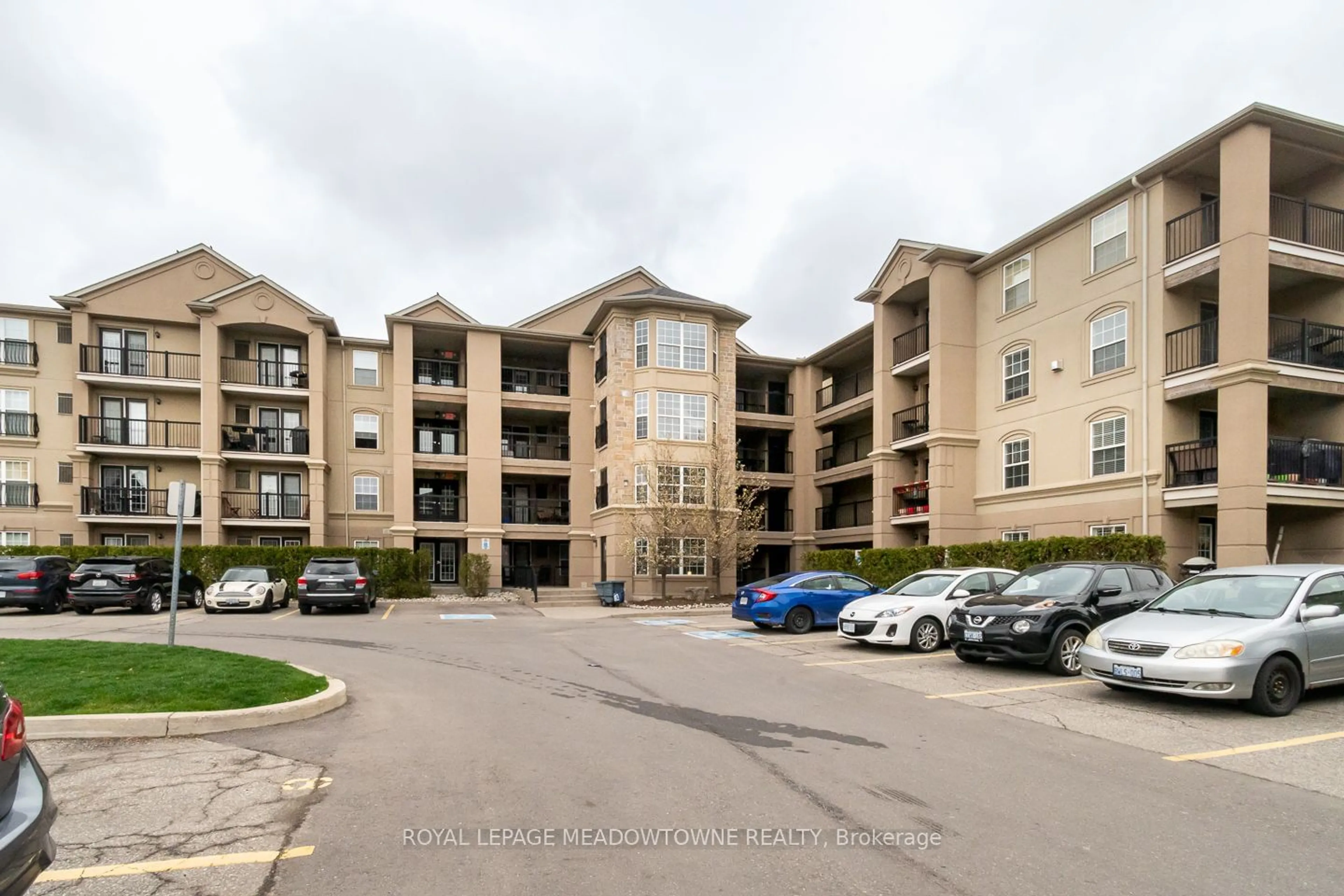 A pic from exterior of the house or condo for 1483 Maple Ave #406, Milton Ontario L9T 0B6