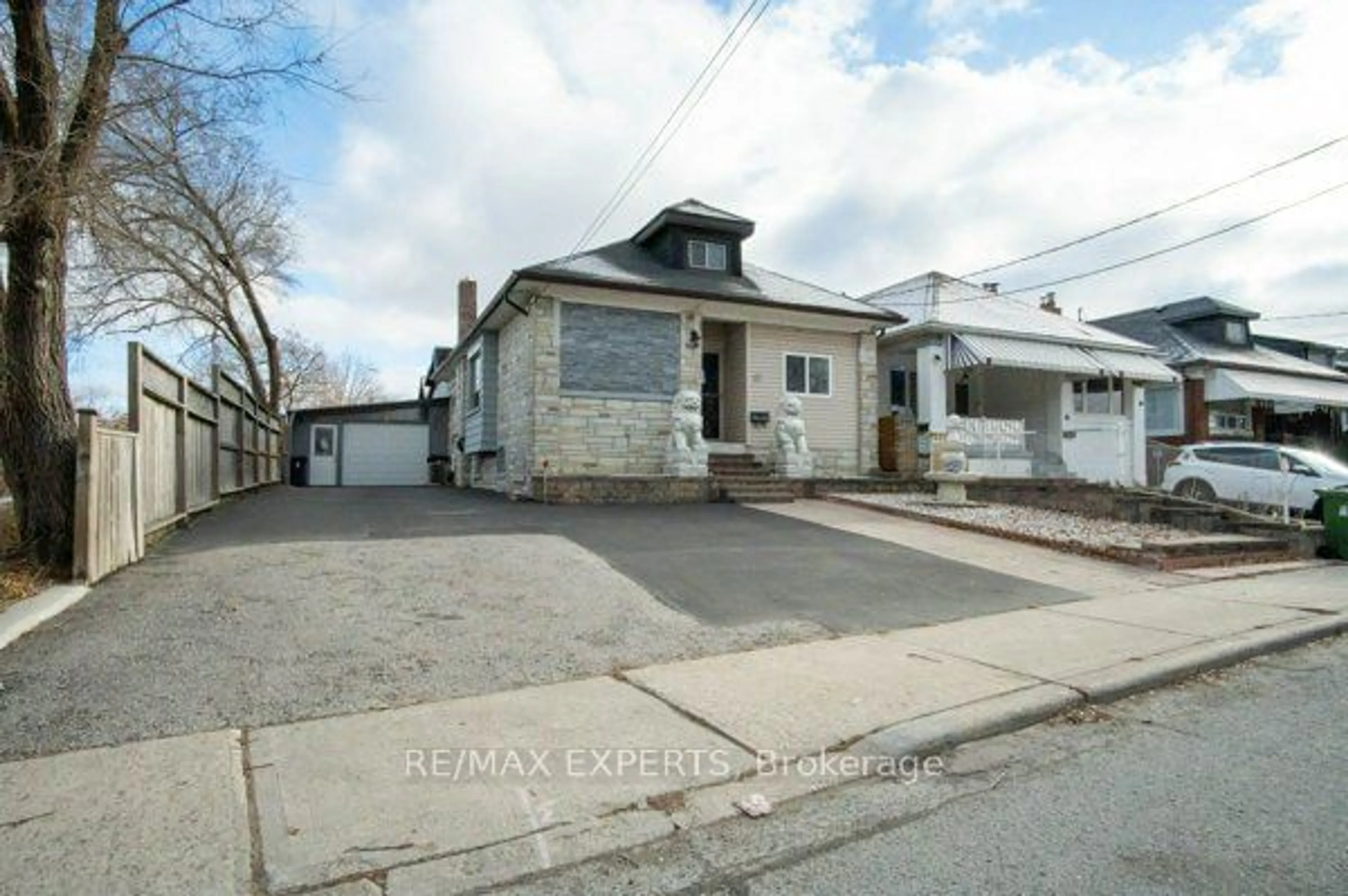 Frontside or backside of a home for 87 Castleton Ave, Toronto Ontario M6N 3Z7