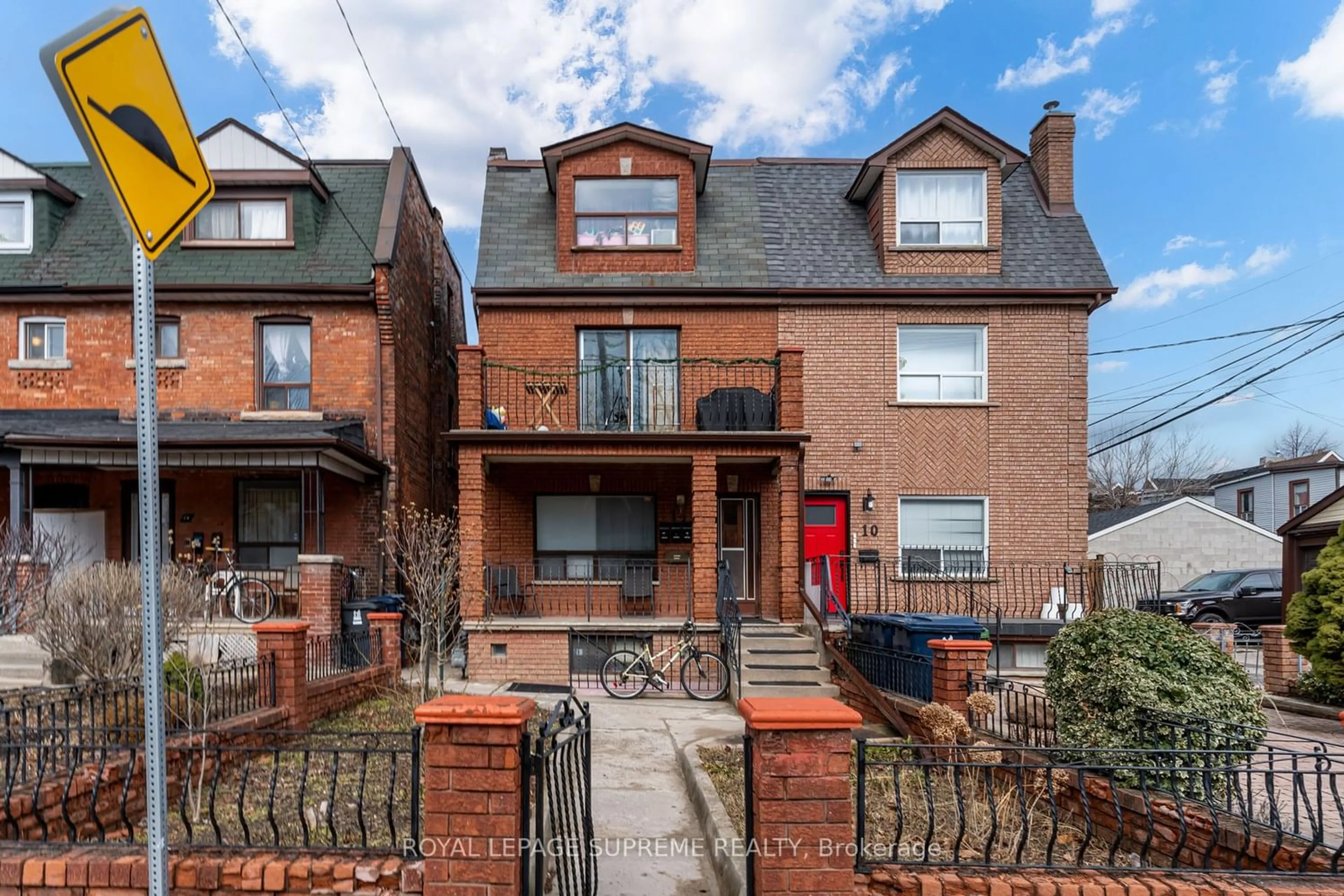 Home with brick exterior material for 12 Wallace Ave, Toronto Ontario M6H 1T5