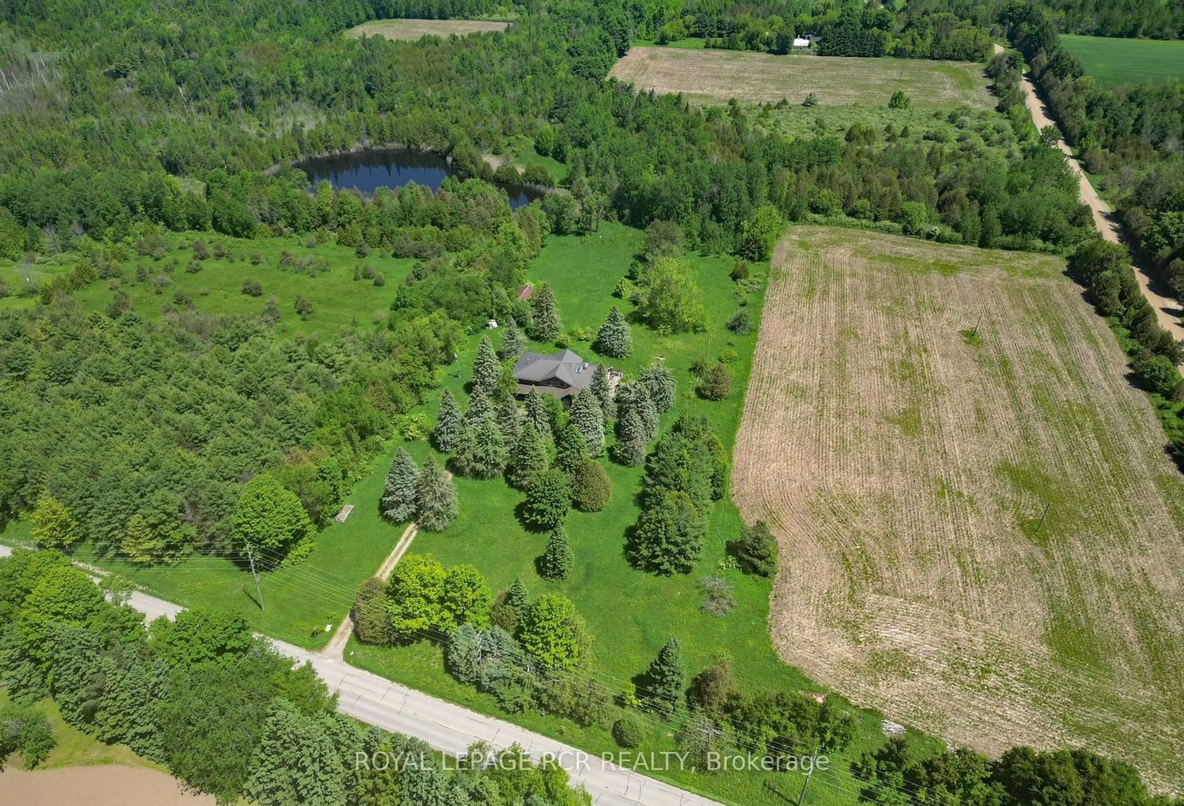 A pic from outside/outdoor area/front of a property/back of a property/a pic from drone, forest/trees view for 19455 Shaws Creek Rd, Caledon Ontario L7K 1L5