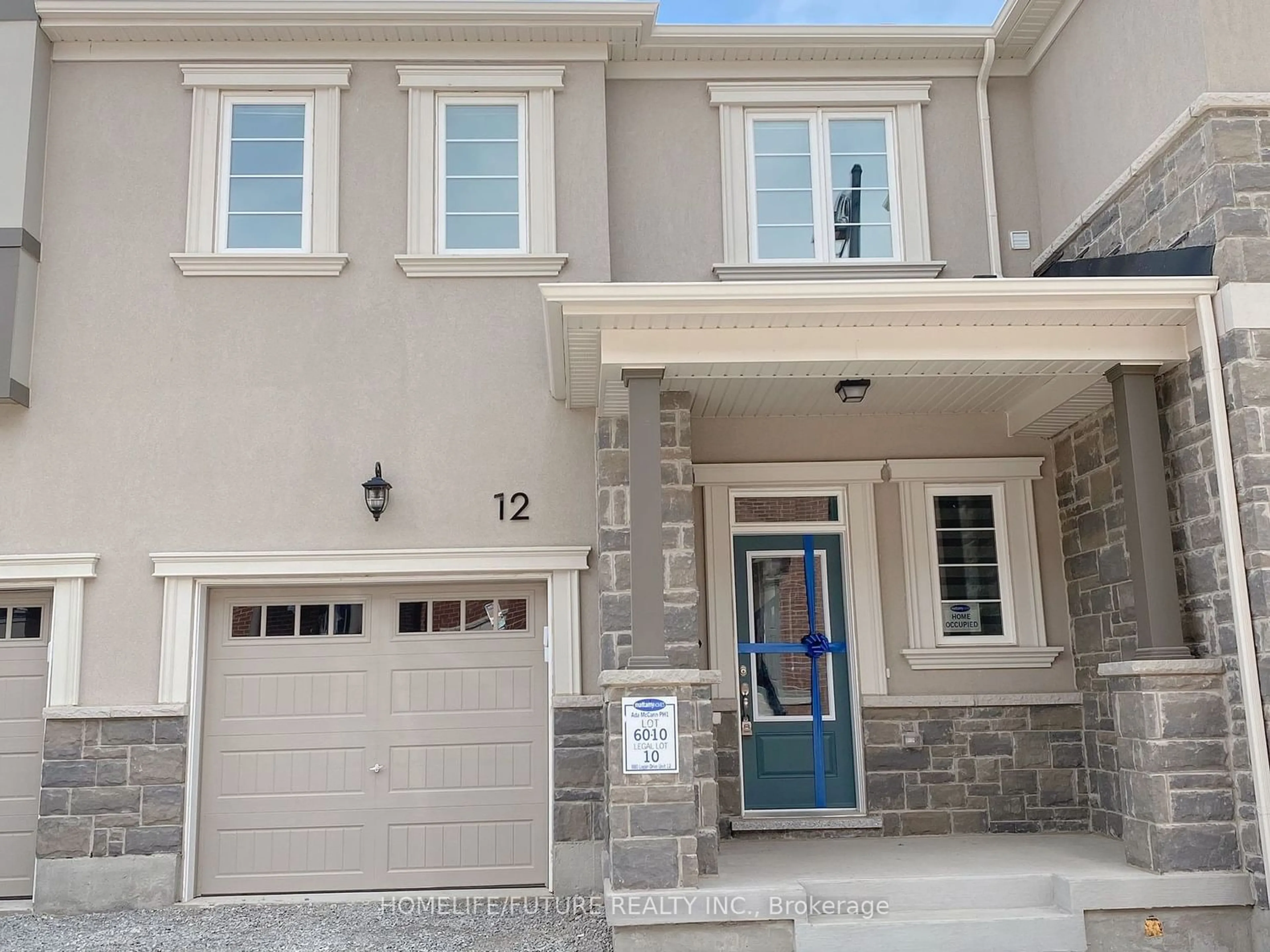 A pic from exterior of the house or condo for 980 Logan Dr #12, Milton Ontario L9E 1T1