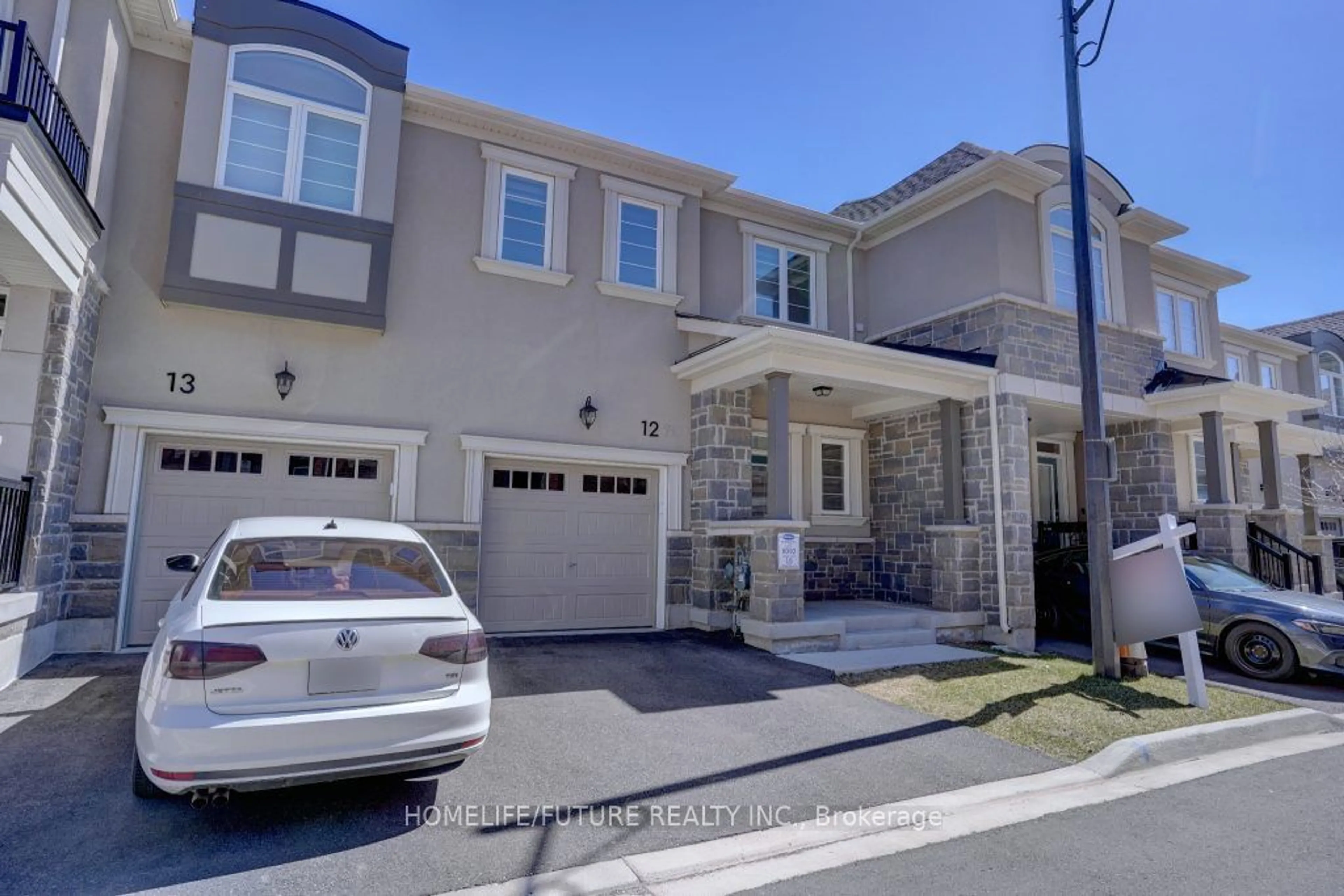 Frontside or backside of a home for 980 Logan Dr #12, Milton Ontario L9E 1T1