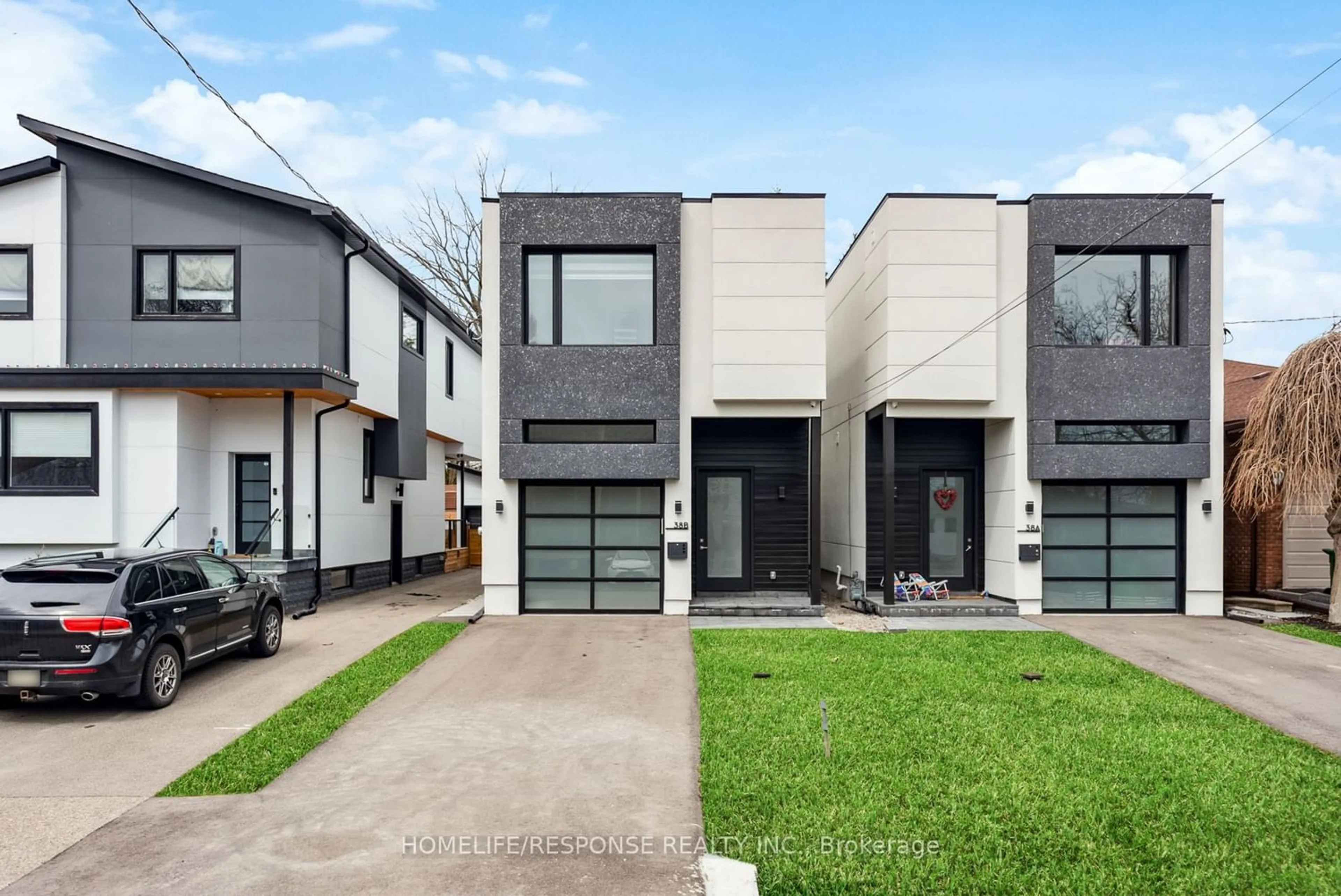 Frontside or backside of a home for 38 B Alcan Ave, Toronto Ontario M8W 1V5