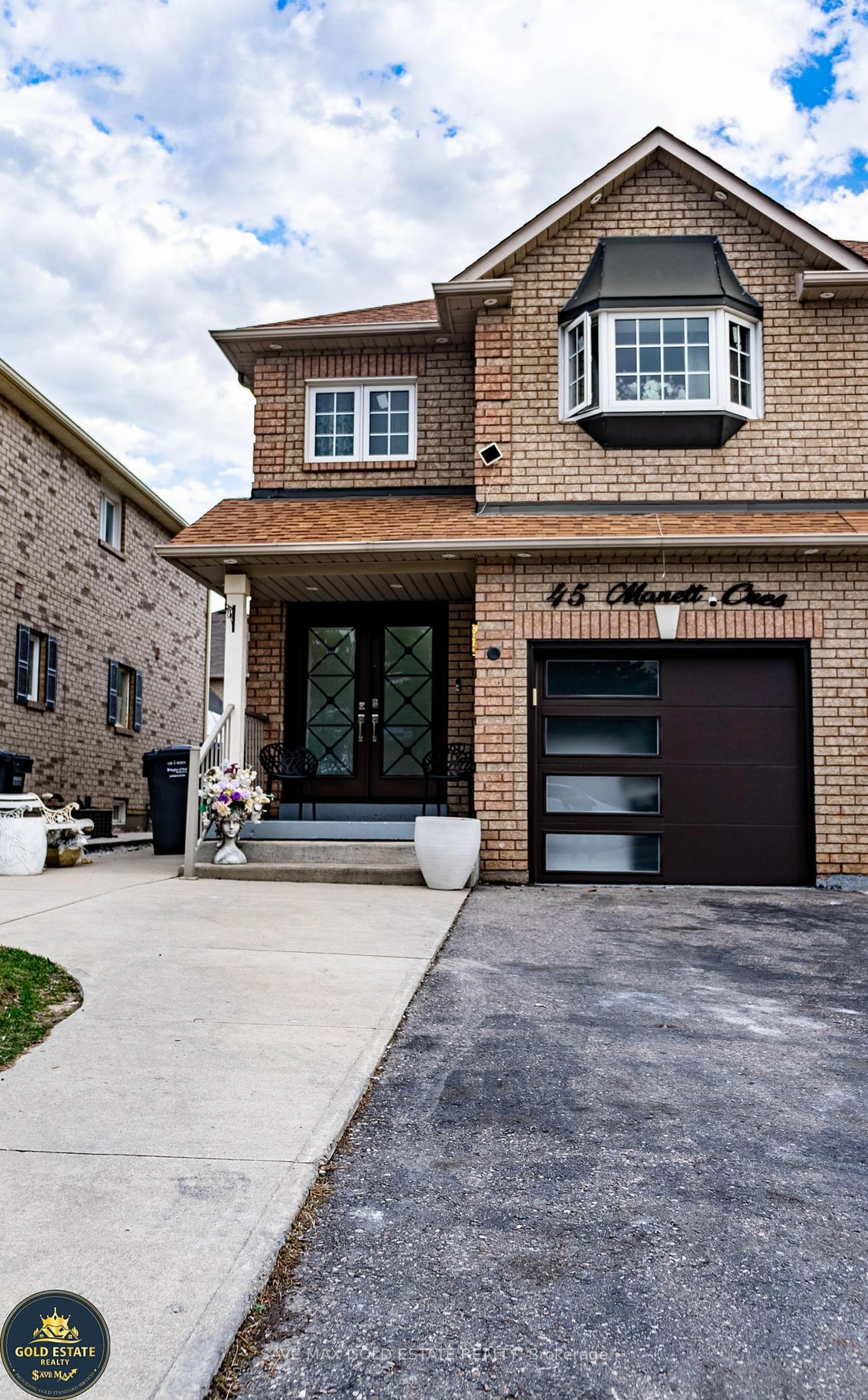 Home with brick exterior material for 45 Manett Cres, Brampton Ontario L6X 4X4